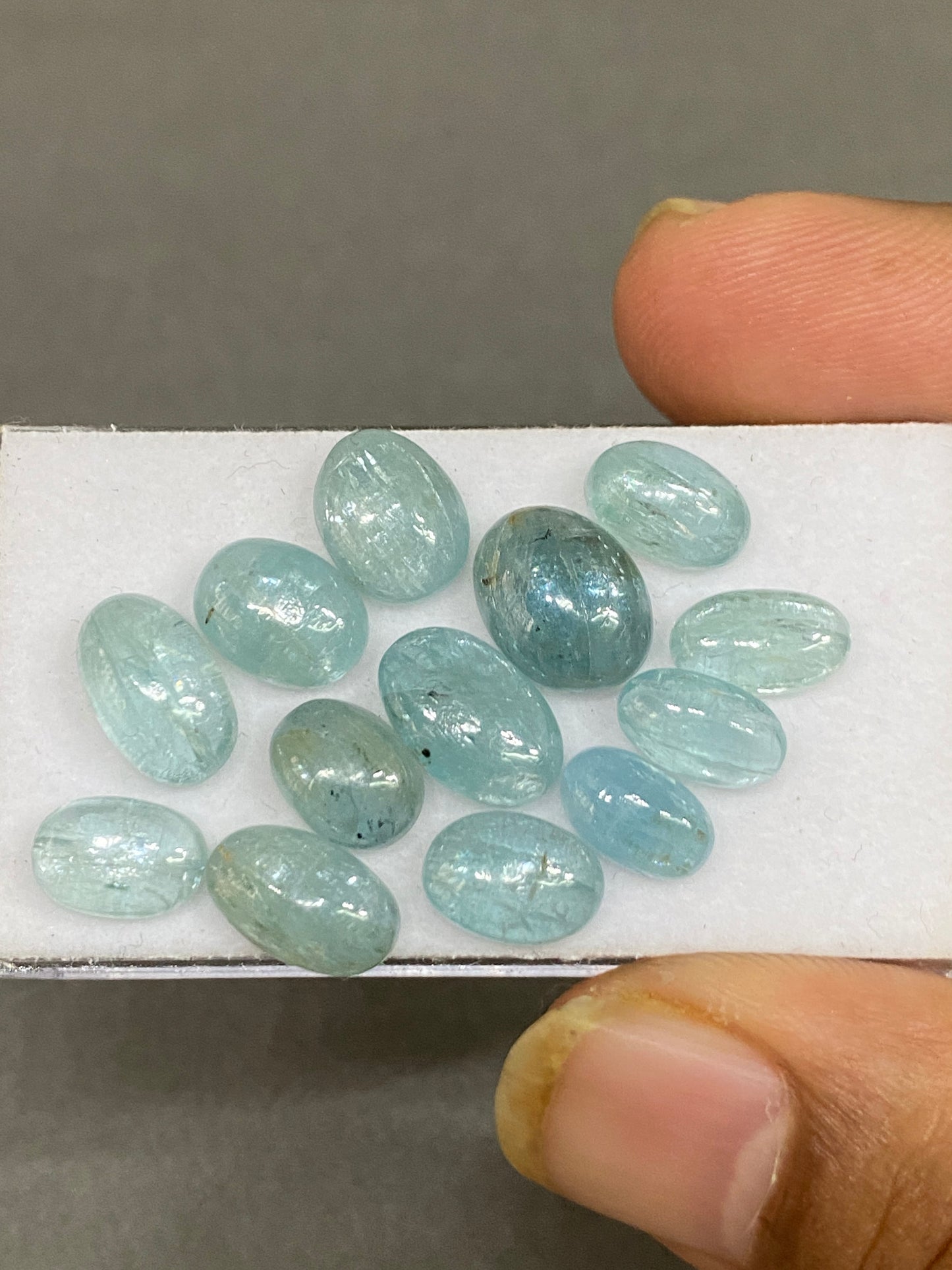 Vivacious rare aqua blue  oval cabochons fine quality wt  34 cts size 9x6mm-11x7mm  pcs 13 aqua kyanite oval smooth cabs