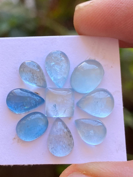 Gorgeous rare blue  Aquamarine oval pear mix shape cabochons Fine quality  pcs 9 wt 12.25 cts Size 8x6mm-9x6mm aquamarine cabochons