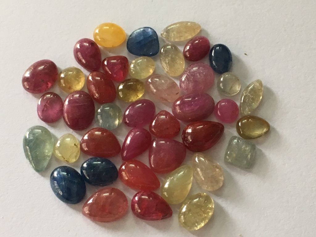 Colorful rare fine quality umba sapphire natural unheated untreated sapphire flat cabochons wt 56.80 carats pcs 41  natural sapphire