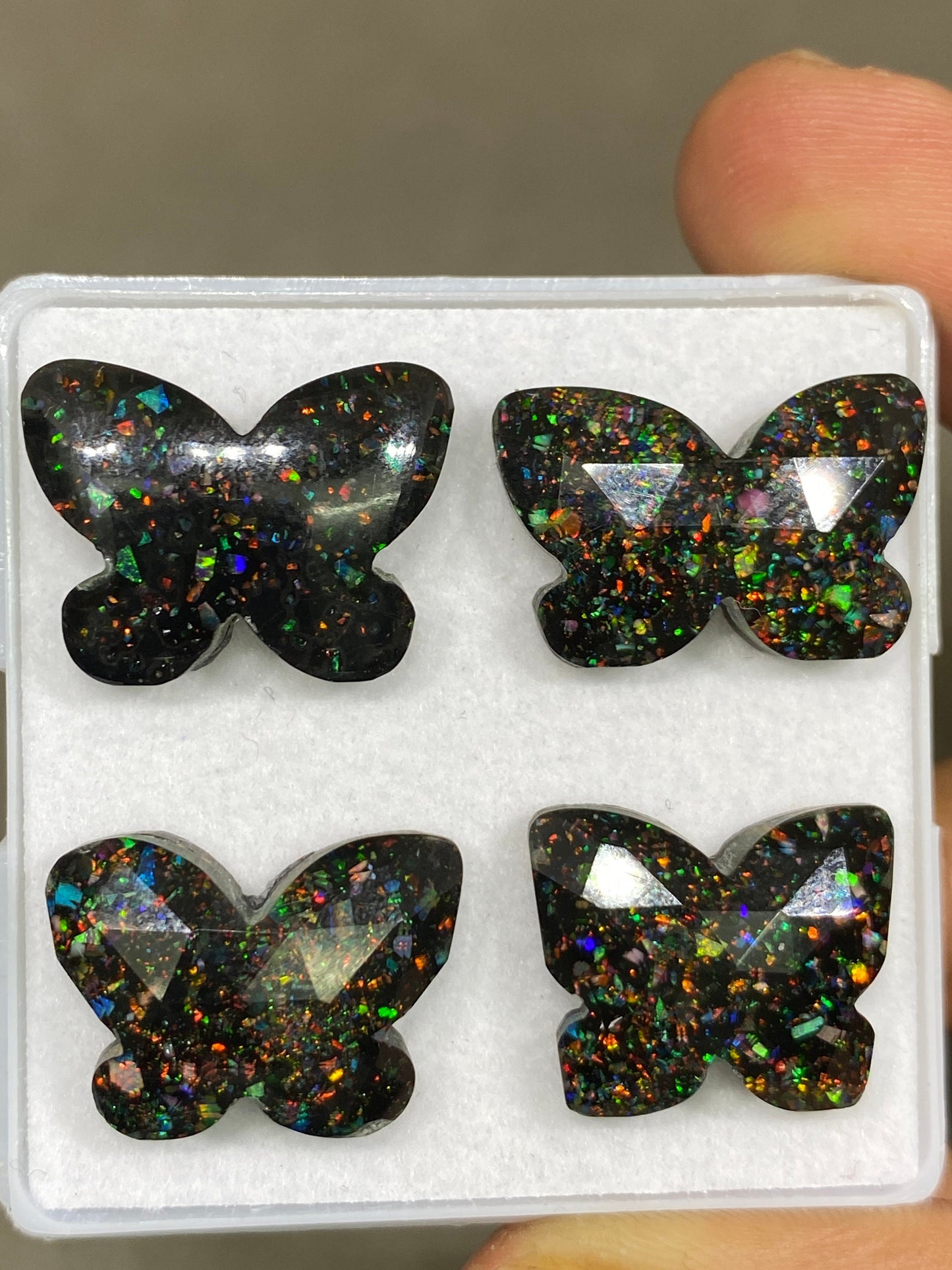 Fascinating  Multi fire opal synthetic aurora opal with black onyx faceted butterfly carving pcs 4 wt 52 cts 19x15-22x15mm butterfly carving