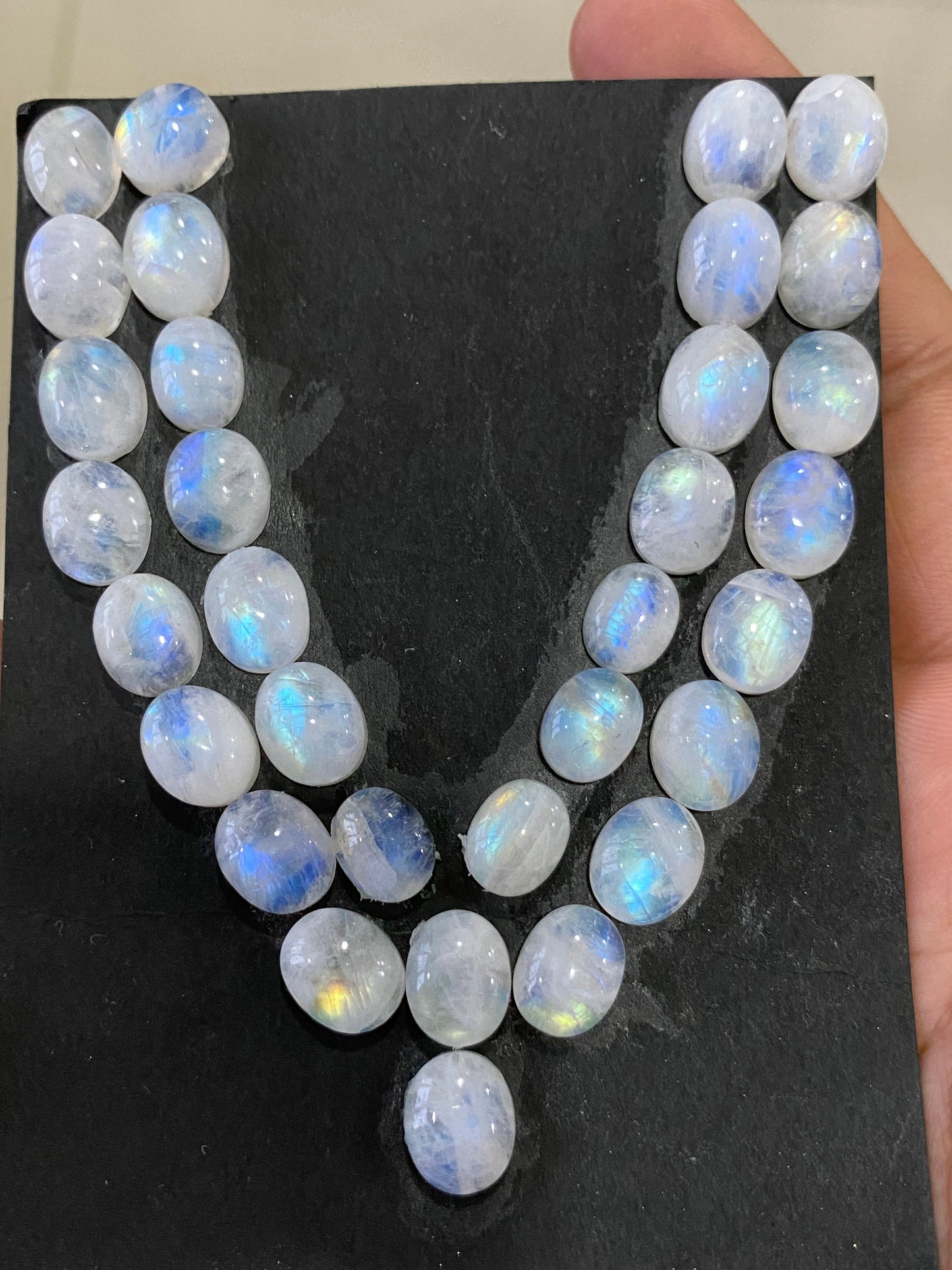 Fascinating Blue fire rainbow moonstone oval cabochons lot pcs 33  weight 141 cts size 10.1x8.3mm-11.3x9mm lovely fire rainbow moonstone