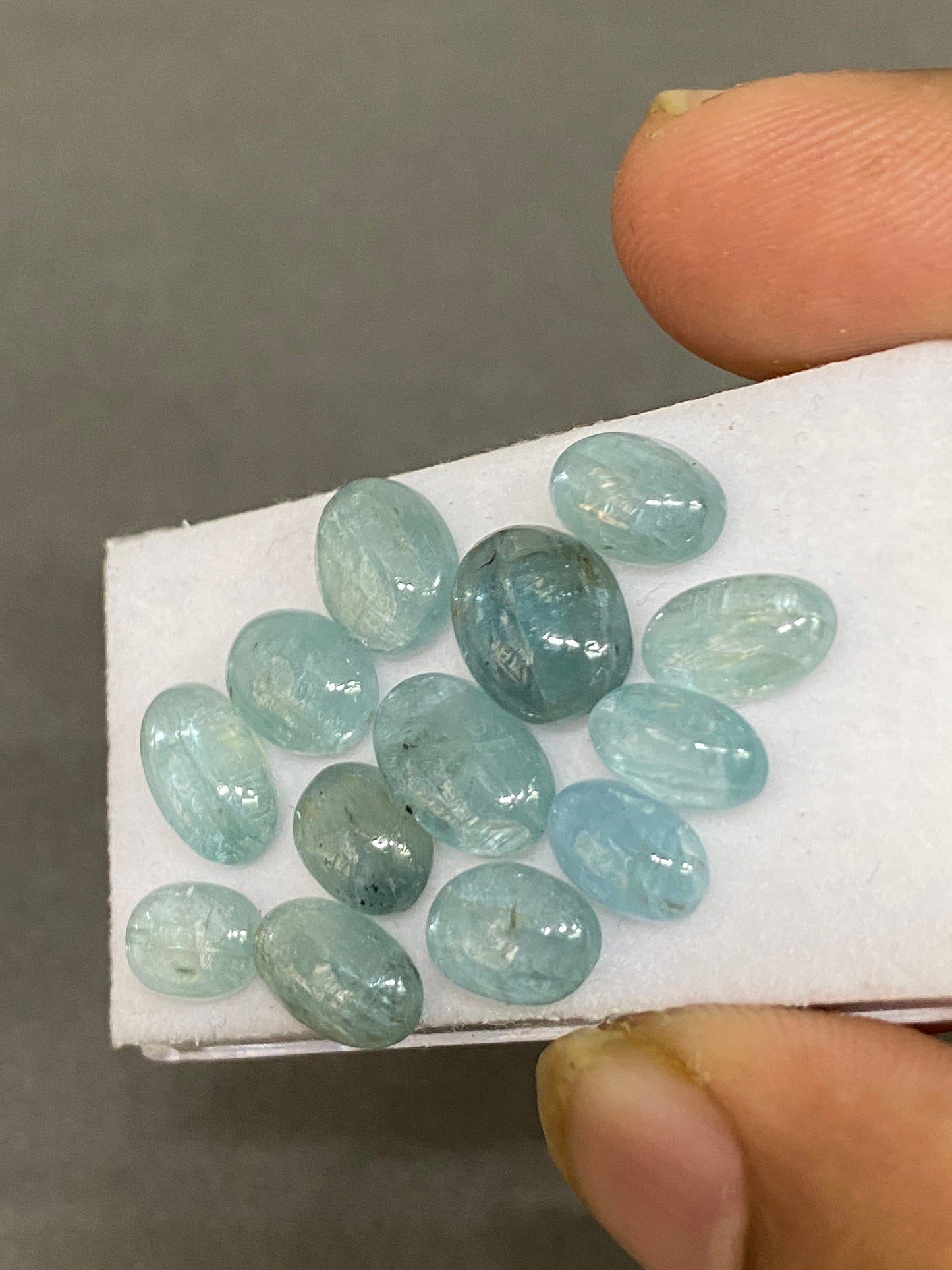 Vivacious rare aqua blue  oval cabochons fine quality wt  34 cts size 9x6mm-11x7mm  pcs 13 aqua kyanite oval smooth cabs