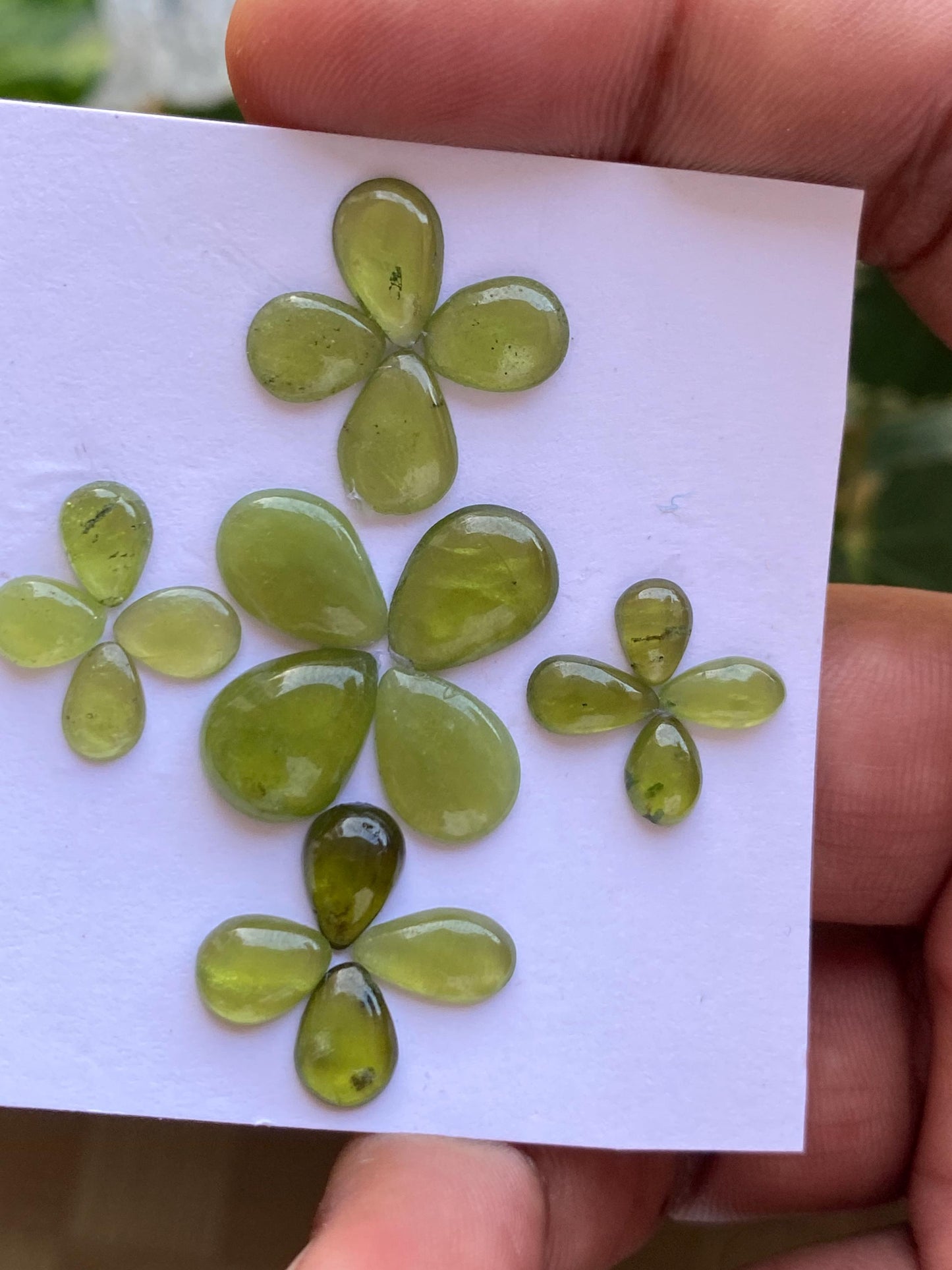 Gorgeous rare fine quality peridot cabochons pear shape wholesale lot weight 27 carats size 6.9x5-13x10mm pieces 20 peridot cabochons