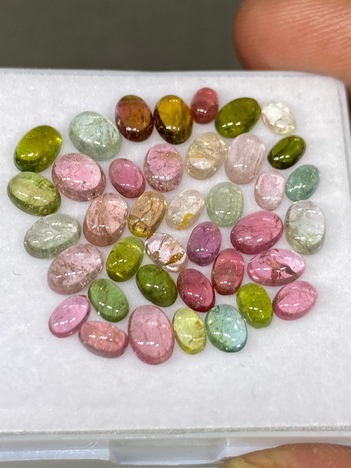 Stunning rare Pink multi tourmaline oval cabochons lovely quality size 4.8x3-6.2x5mm  wt 14.20 cts pcs 39 pink tourmaline cabochons