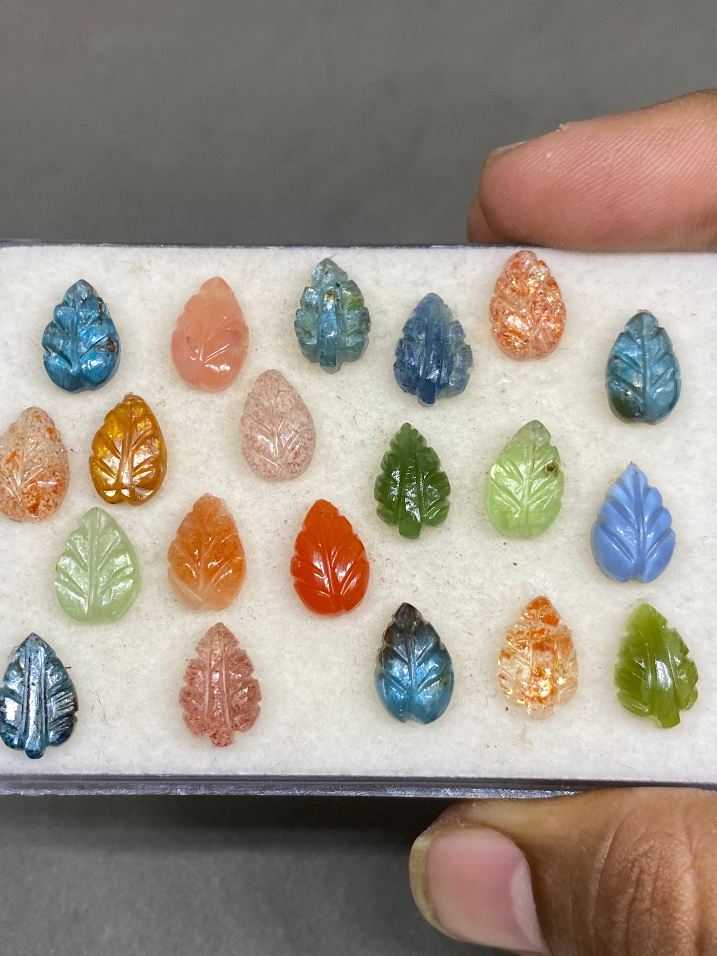 Eyecatching multi stone kyanite sunstone Vesuvianite carnelian strawberry quartz leaves carving wt 58 carats pcs 20 good size 12x8mm leaves