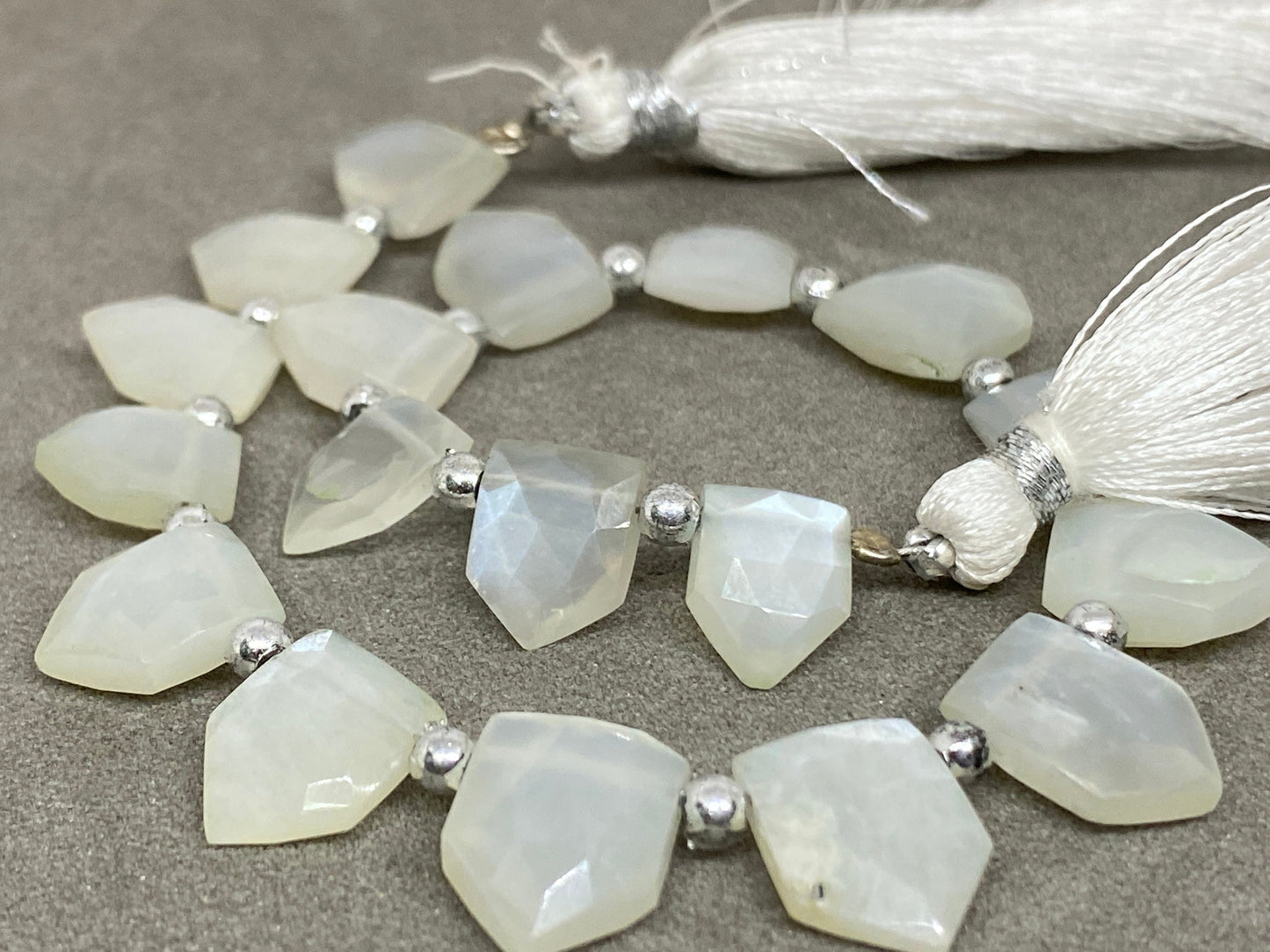 Wow white moonstone faceted pentagon hut briolette 8 inches wt 54 cts  pcs 18 size 9x7mm-12x9mm faceted moonstone hut briolette