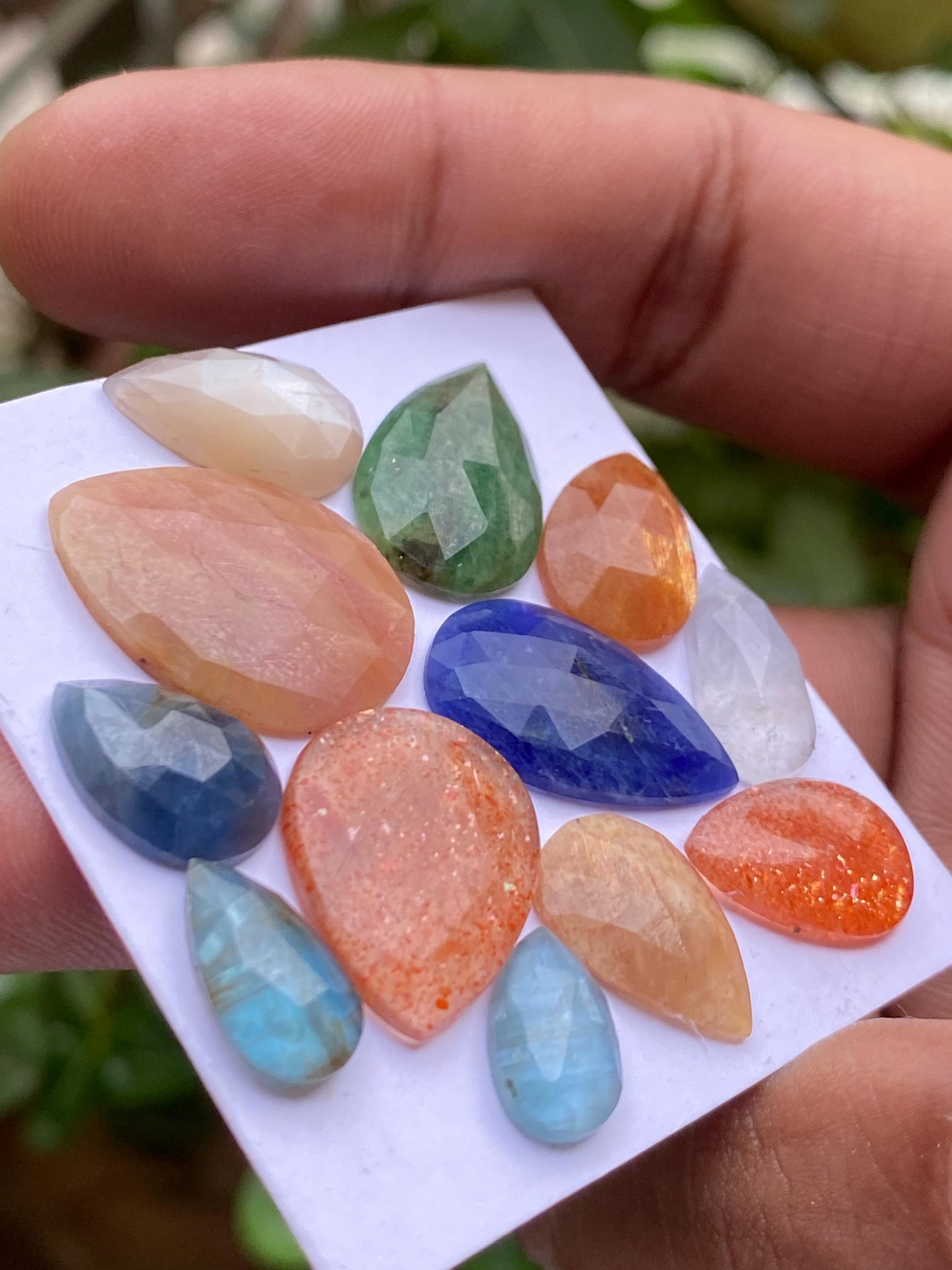 Dazzling multi stones sodalite apatite sunstone sapphire kyanite emerald rosecut pears pcs 12 wt 59.10 carats size 11.8x7mm-22x16mm