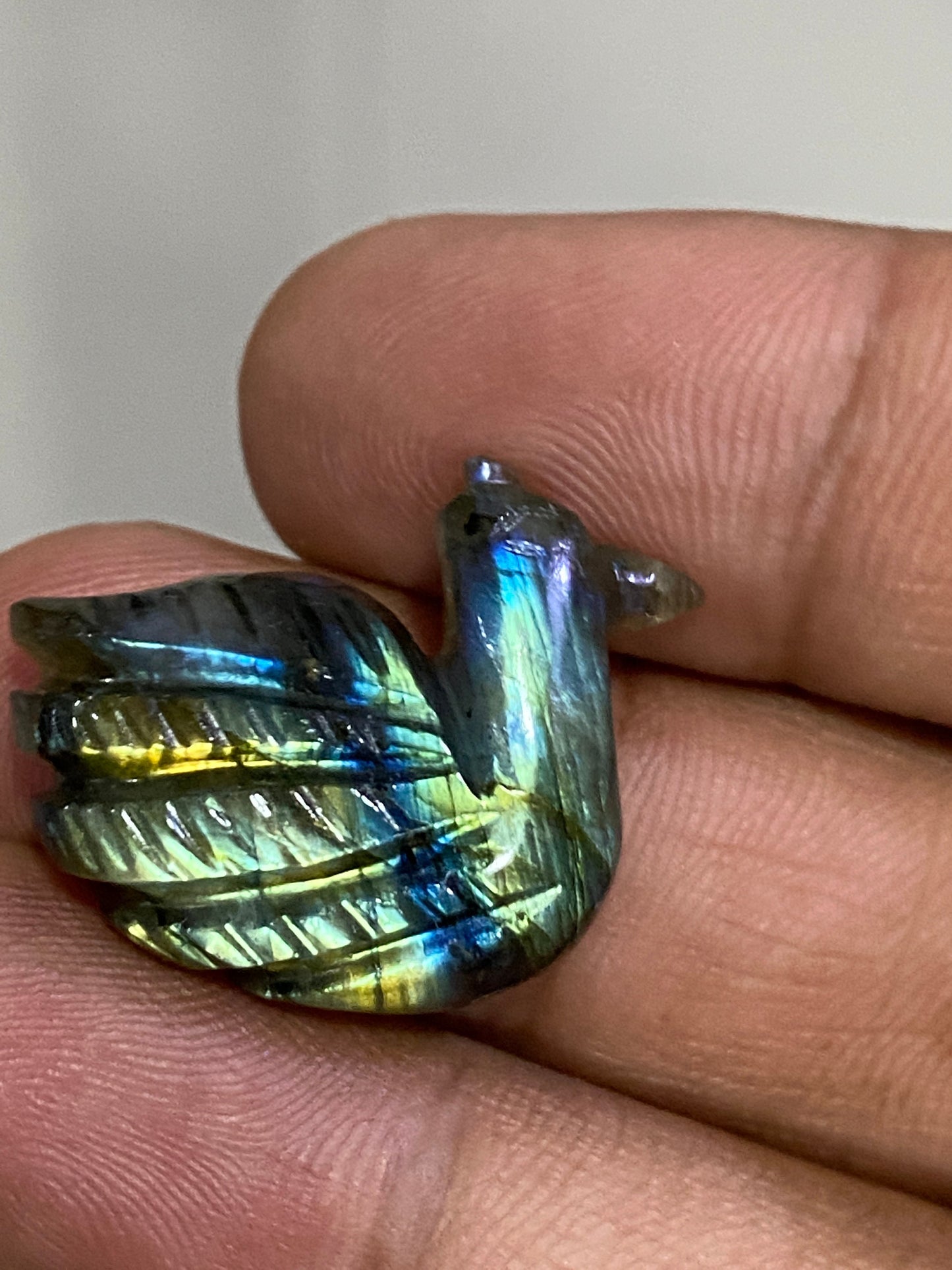 Fascinating blue green Fire duck Labradorite carving labradorite blue green fire duck carving wt 27 cts size 27x21mm gemstone carving