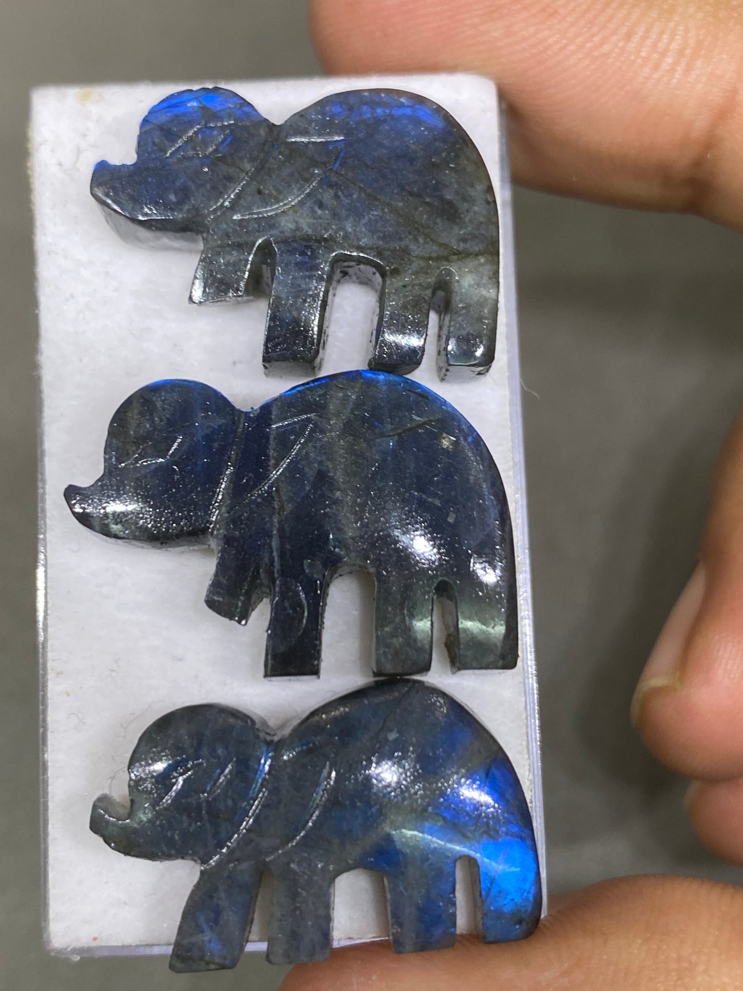 Awesome rare Black rainbow labradorite elephant carving  blue fire smooth  pcs 3 wt 59 cts size 25x15-27x18mm labradorite elephant carving