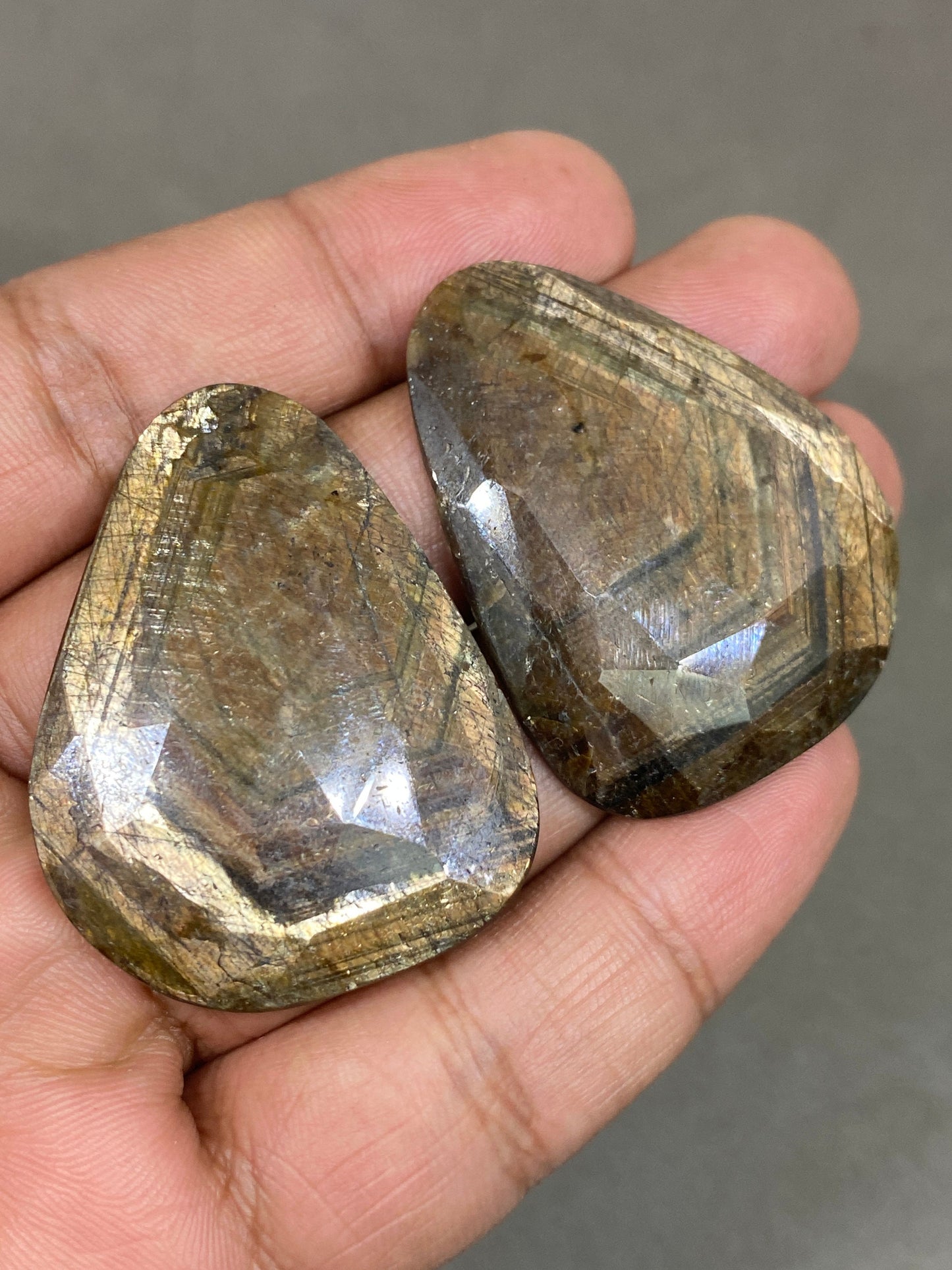 Extremely rare huge fancy shape golden sheen sapphires matched pair weight 164 cts size 43x35-45x35mm gold sheen sapphire rosecut pair