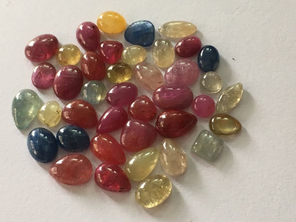 Colorful rare fine quality umba sapphire natural unheated untreated sapphire flat cabochons wt 56.80 carats pcs 41  natural sapphire