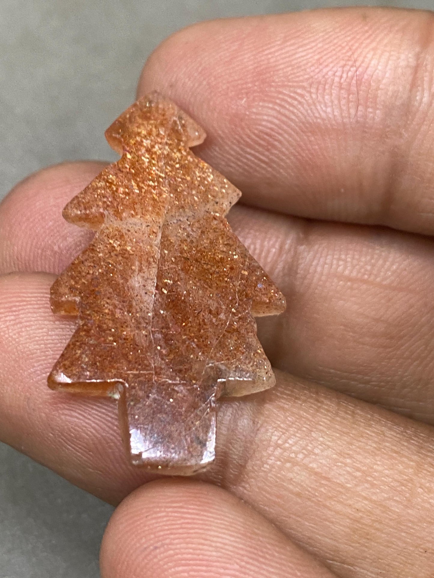 Stunning Confetti Sunstone christmas tree shape carving  pcs 1 wt 19.10 cts size 35x18mm Sunstone Christmas tree carving