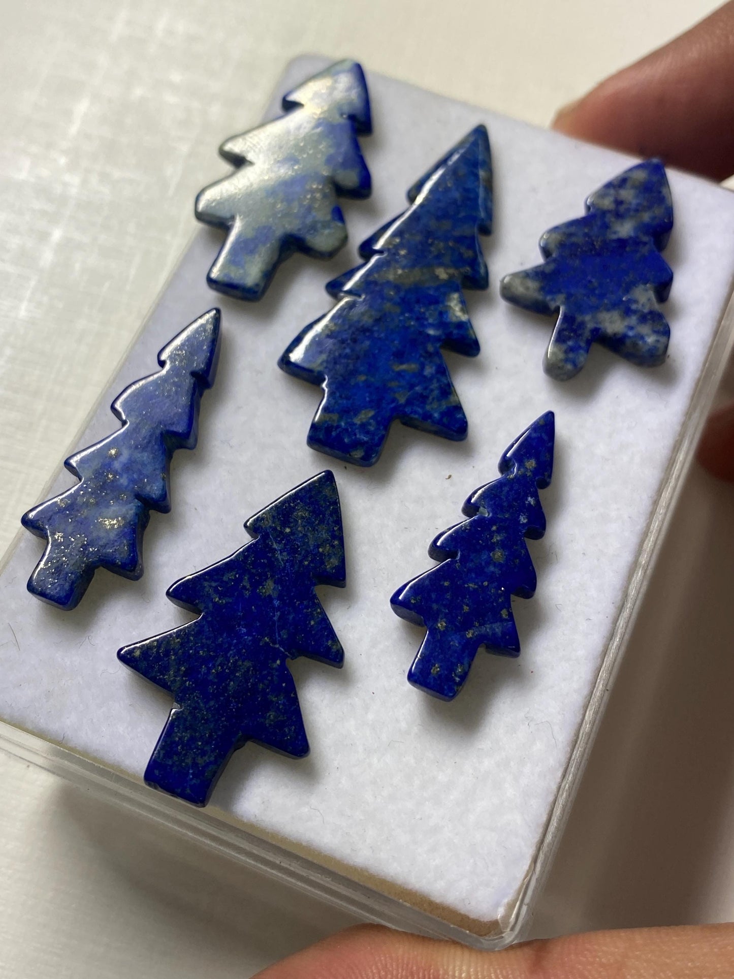 Wow lapis lazuli smooth christmas tree shape carving  pcs 6 wt 77.20 cts size 28x17mm lapis lazuli Christmas tree carving