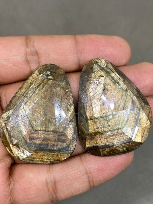 Extremely rare huge fancy shape golden sheen sapphires matched pair weight 164 cts size 43x35-45x35mm gold sheen sapphire rosecut pair