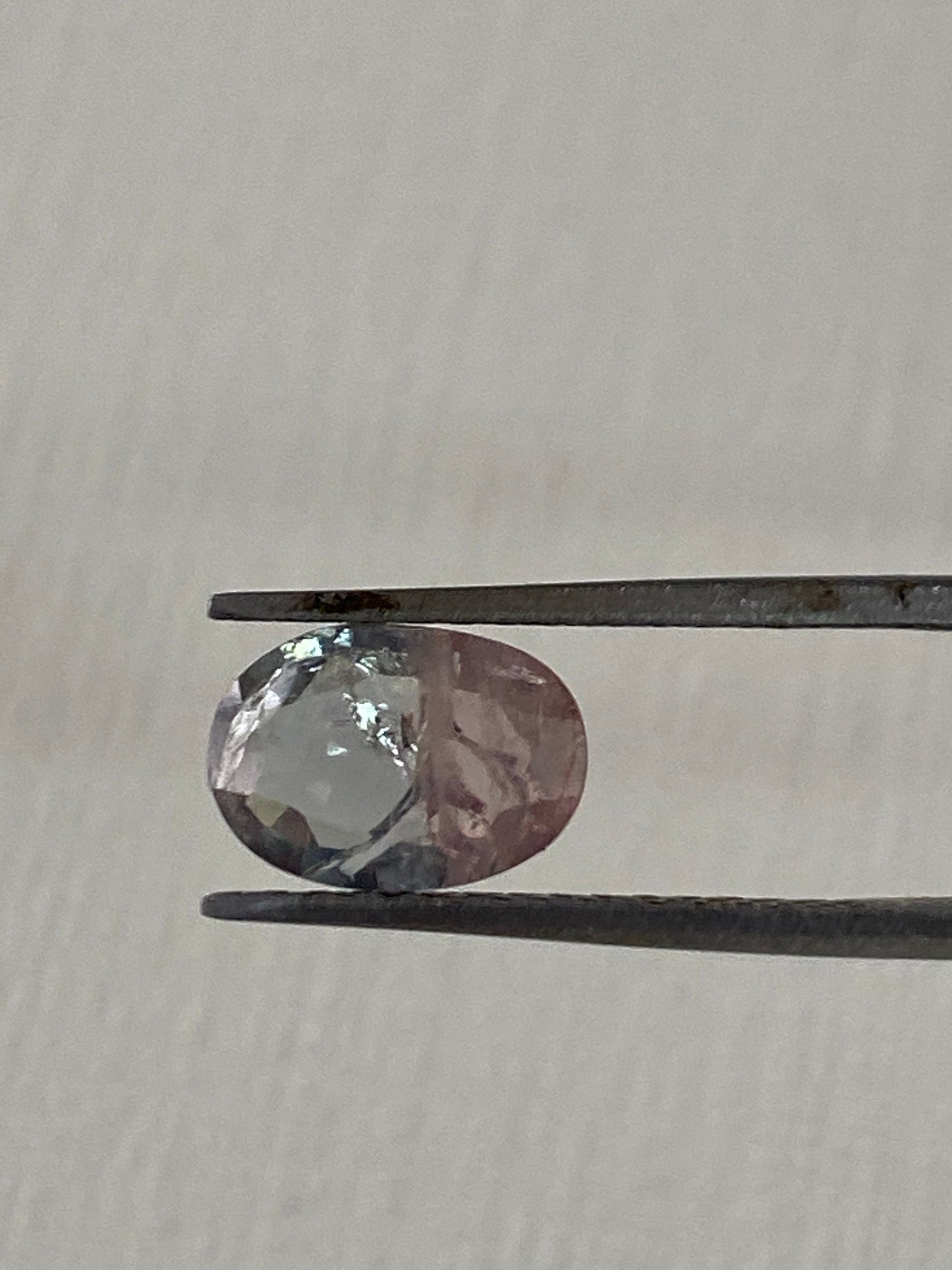 Extremely rare bi color sapphire grey meets pink bi color sapphire natural unheated untreated weight 1.5 carats size 8.8x6.2mm natural