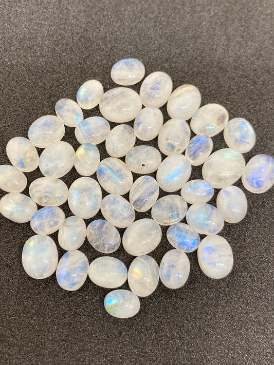 Stunning  fire rainbow moonstone oval cabochons lot size 6-9mm lovely fire rainbow moonstone