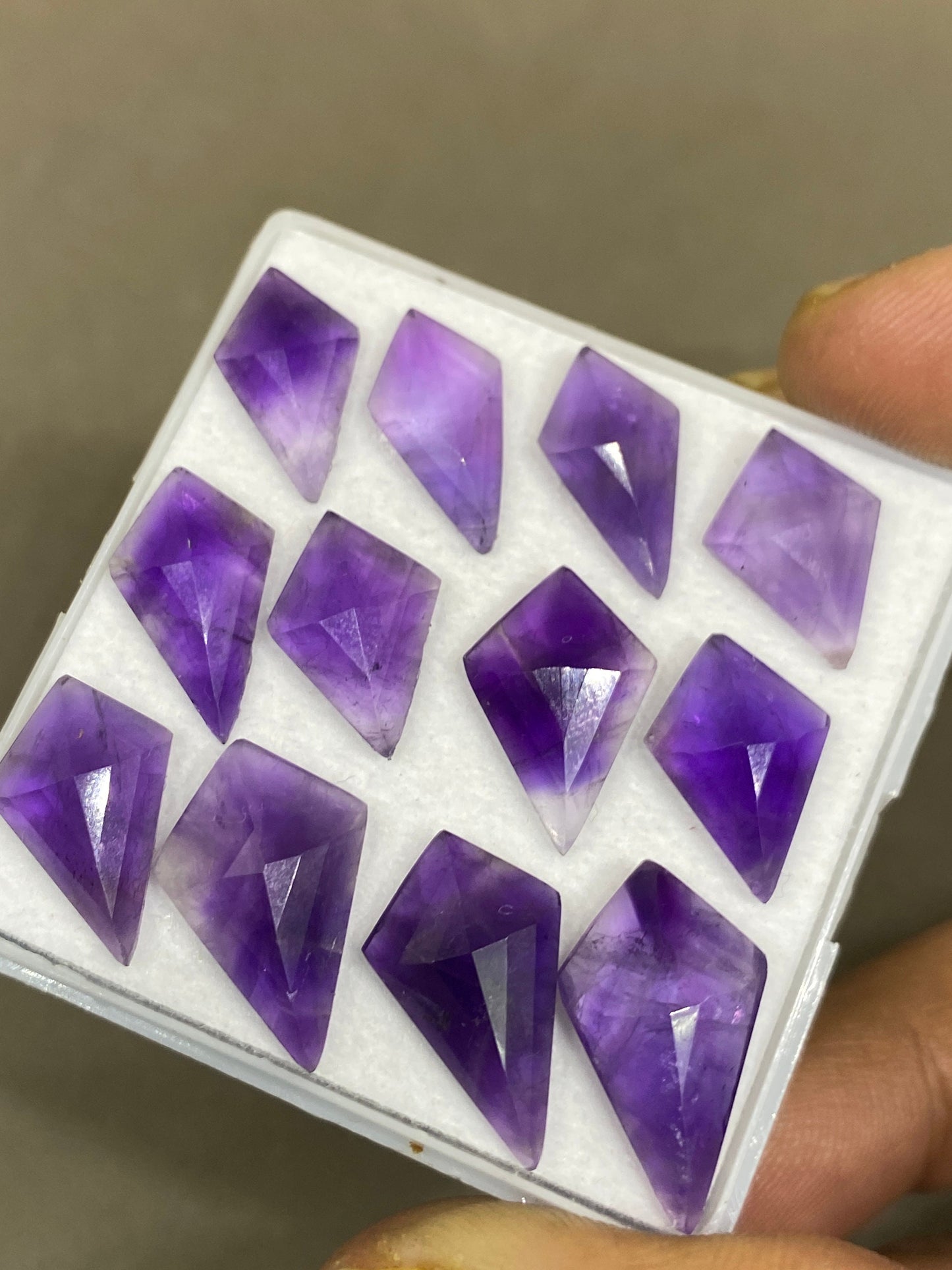 Alluring amethyst  Kite step cuts wt 41 cts  pcs 12 size 15x9-19x12mm Amethyst stepcut kite