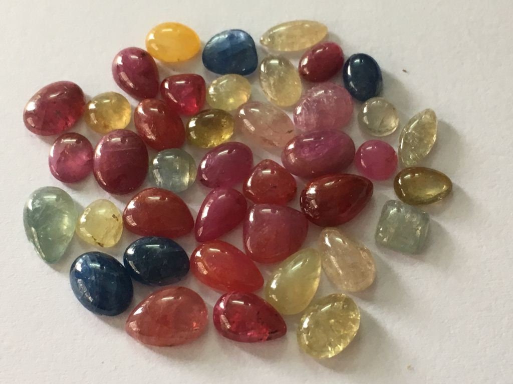 Colorful rare fine quality umba sapphire natural unheated untreated sapphire flat cabochons wt 56.80 carats pcs 41  natural sapphire