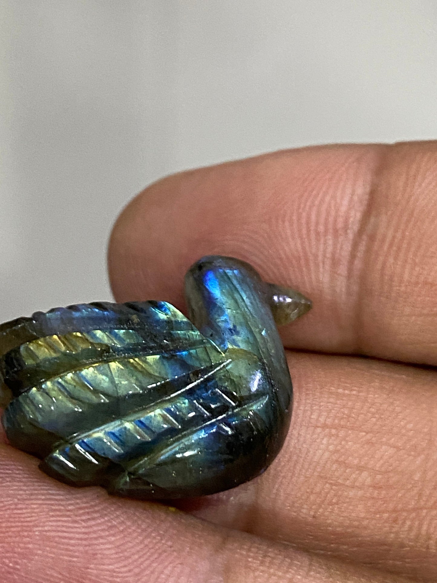 Fascinating blue green Fire duck Labradorite carving labradorite blue green fire duck carving wt 27 cts size 27x21mm gemstone carving