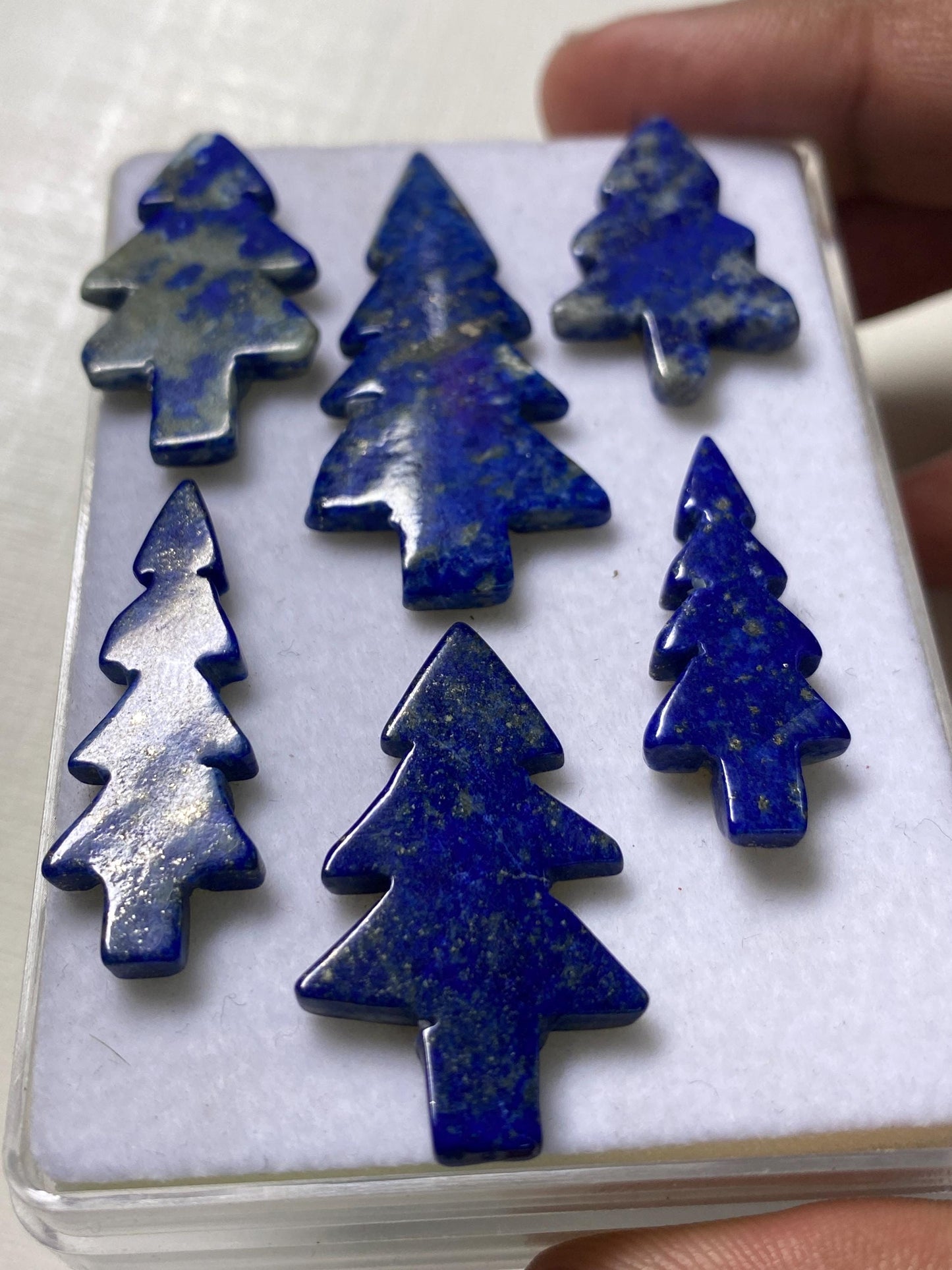 Wow lapis lazuli smooth christmas tree shape carving  pcs 6 wt 77.20 cts size 28x17mm lapis lazuli Christmas tree carving