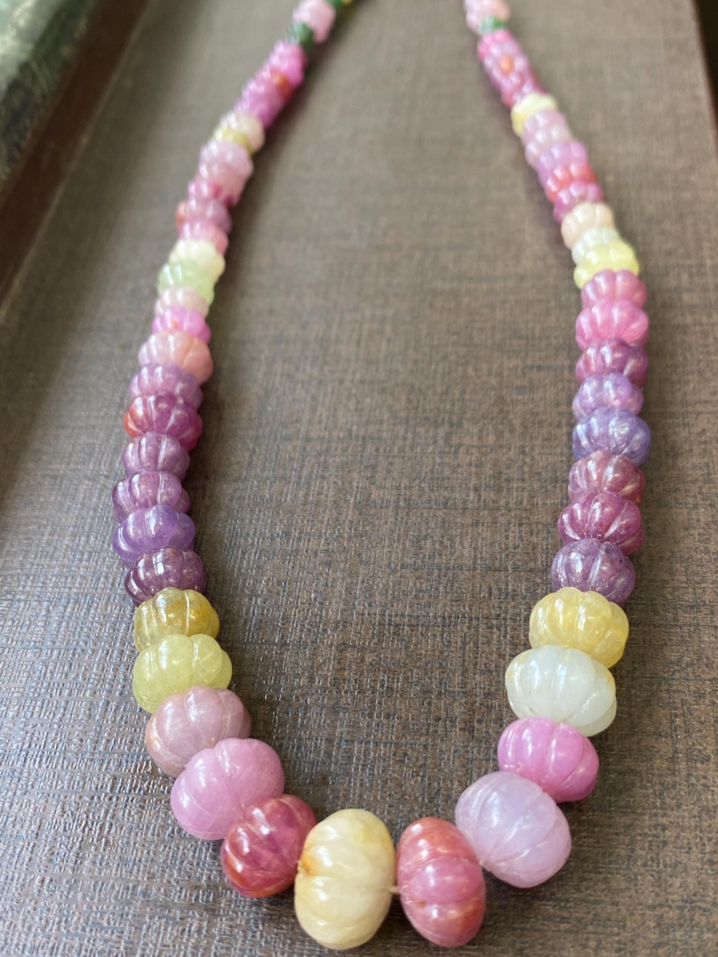 Rare multi sapphire emerald ruby yellow melon carving necklace wt 395 carats size  5x4mm-13mm length 18 inches sapphire carving necklace