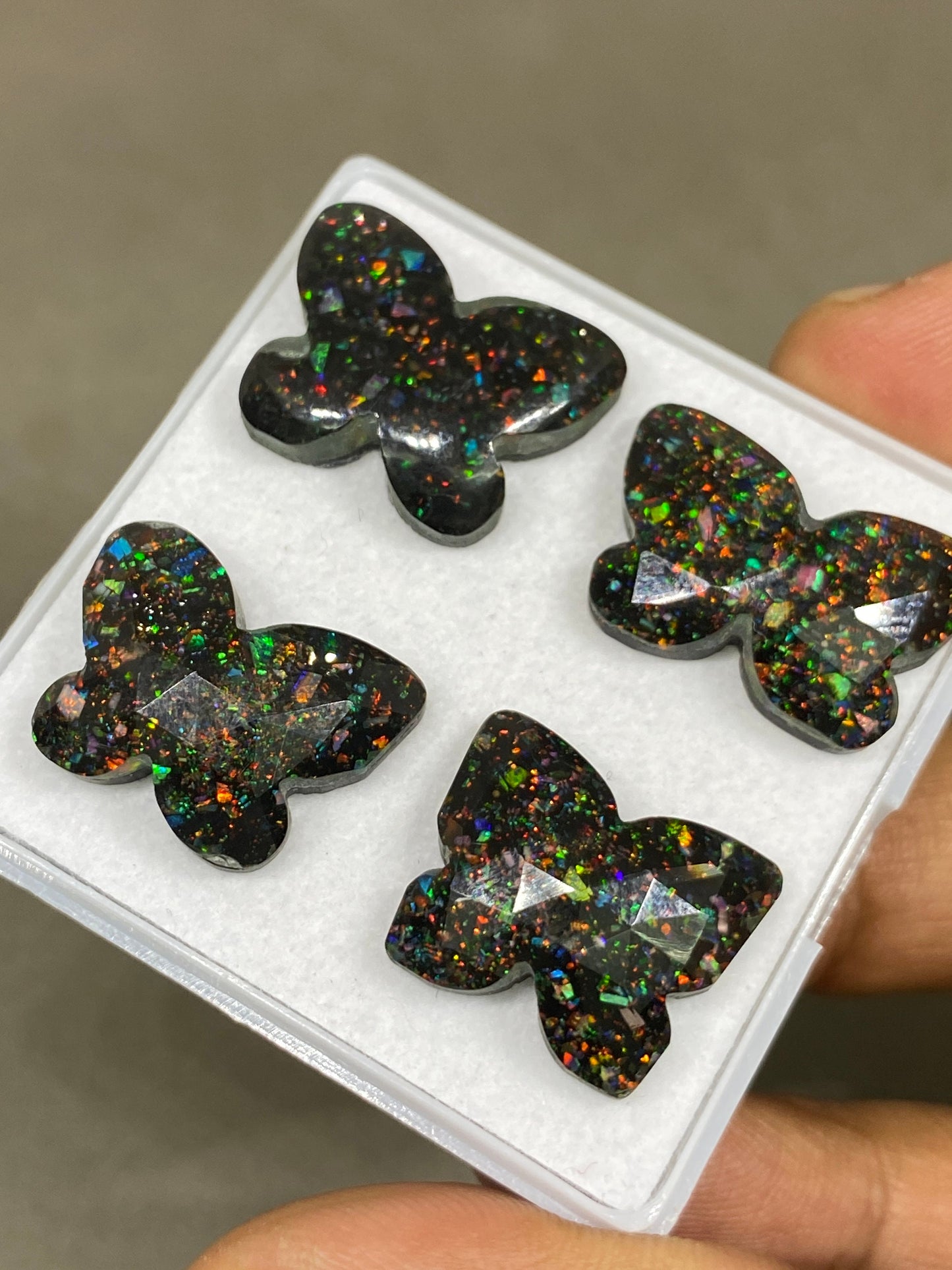 Fascinating  Multi fire opal synthetic aurora opal with black onyx faceted butterfly carving pcs 4 wt 52 cts 19x15-22x15mm butterfly carving