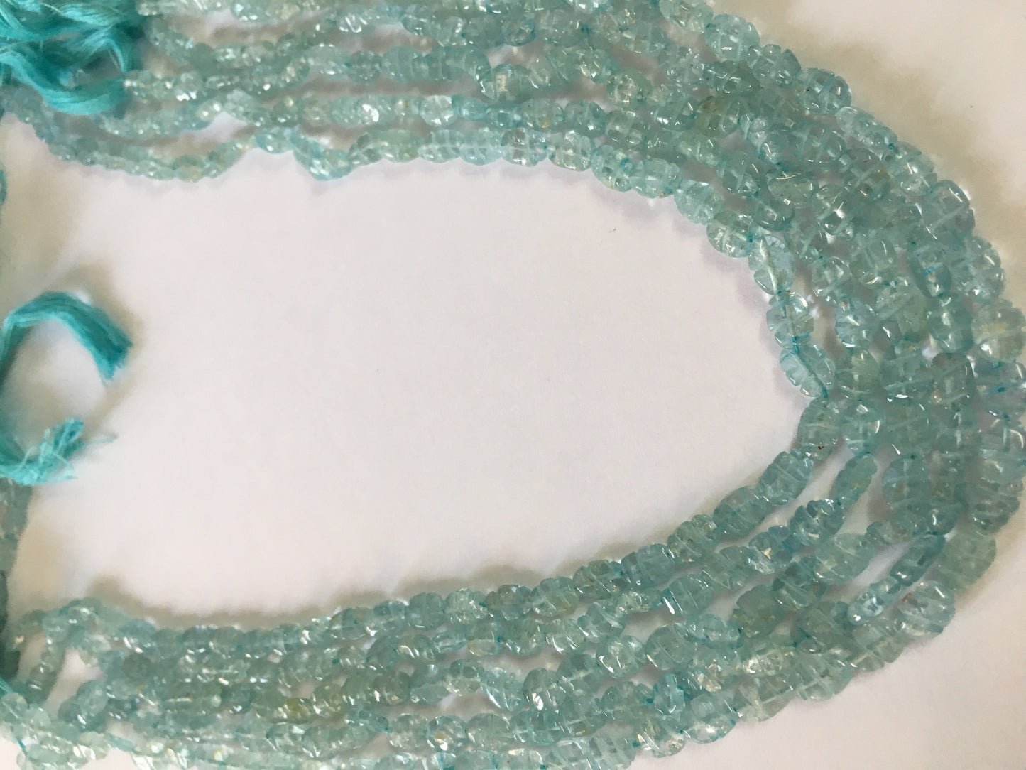 Aquamarine carving strands beautiful aquamarine carving beads size 7x5mm weight 215 carats length 14 inches carved aquamarine strands