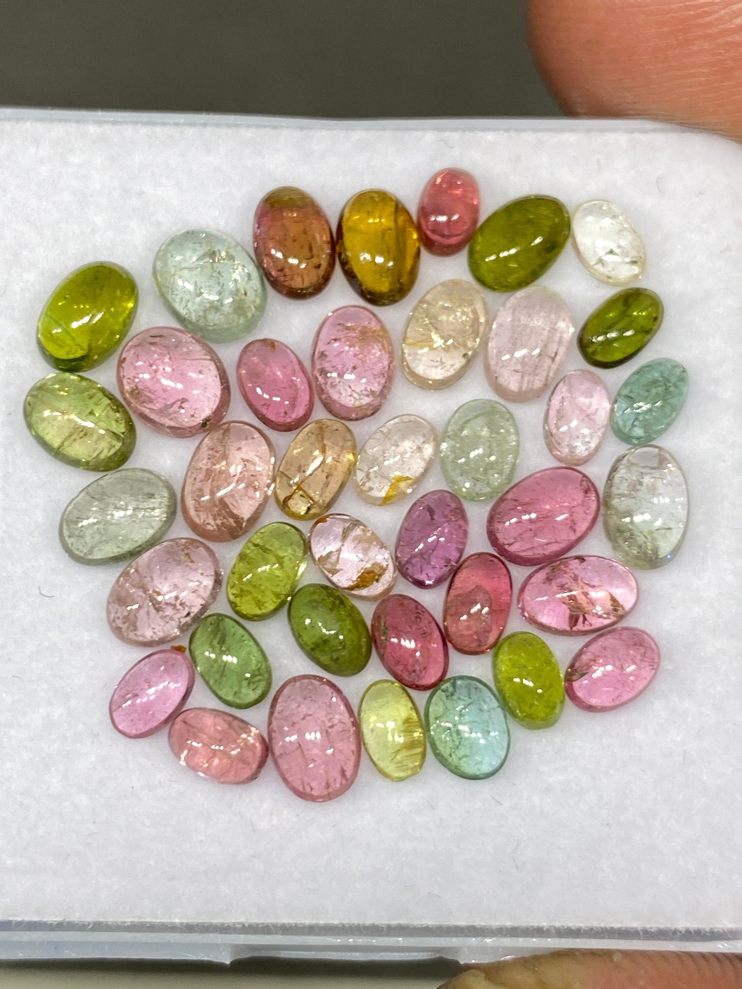 Stunning rare Pink multi tourmaline oval cabochons lovely quality size 4.8x3-6.2x5mm  wt 14.20 cts pcs 39 pink tourmaline cabochons