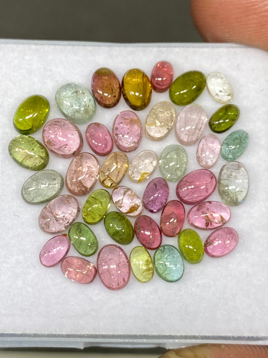 Stunning rare Pink multi tourmaline oval cabochons lovely quality size 4.8x3-6.2x5mm  wt 14.20 cts pcs 39 pink tourmaline cabochons