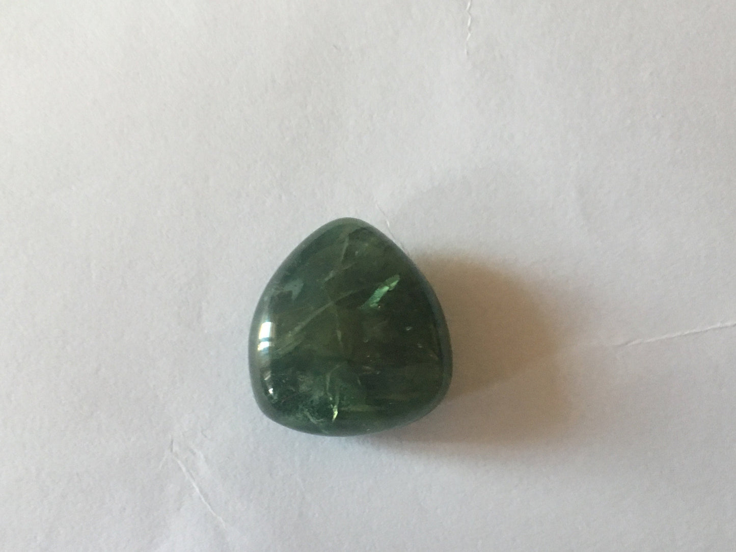 Very beautiful Extremely rare green sapphire big crack in the center 65 carats  umba sapphire smooth polished heart cabochon electric color