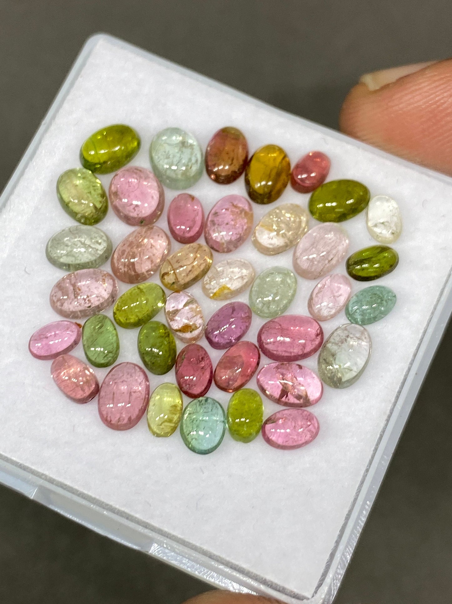 Stunning rare Pink multi tourmaline oval cabochons lovely quality size 4.8x3-6.2x5mm  wt 14.20 cts pcs 39 pink tourmaline cabochons