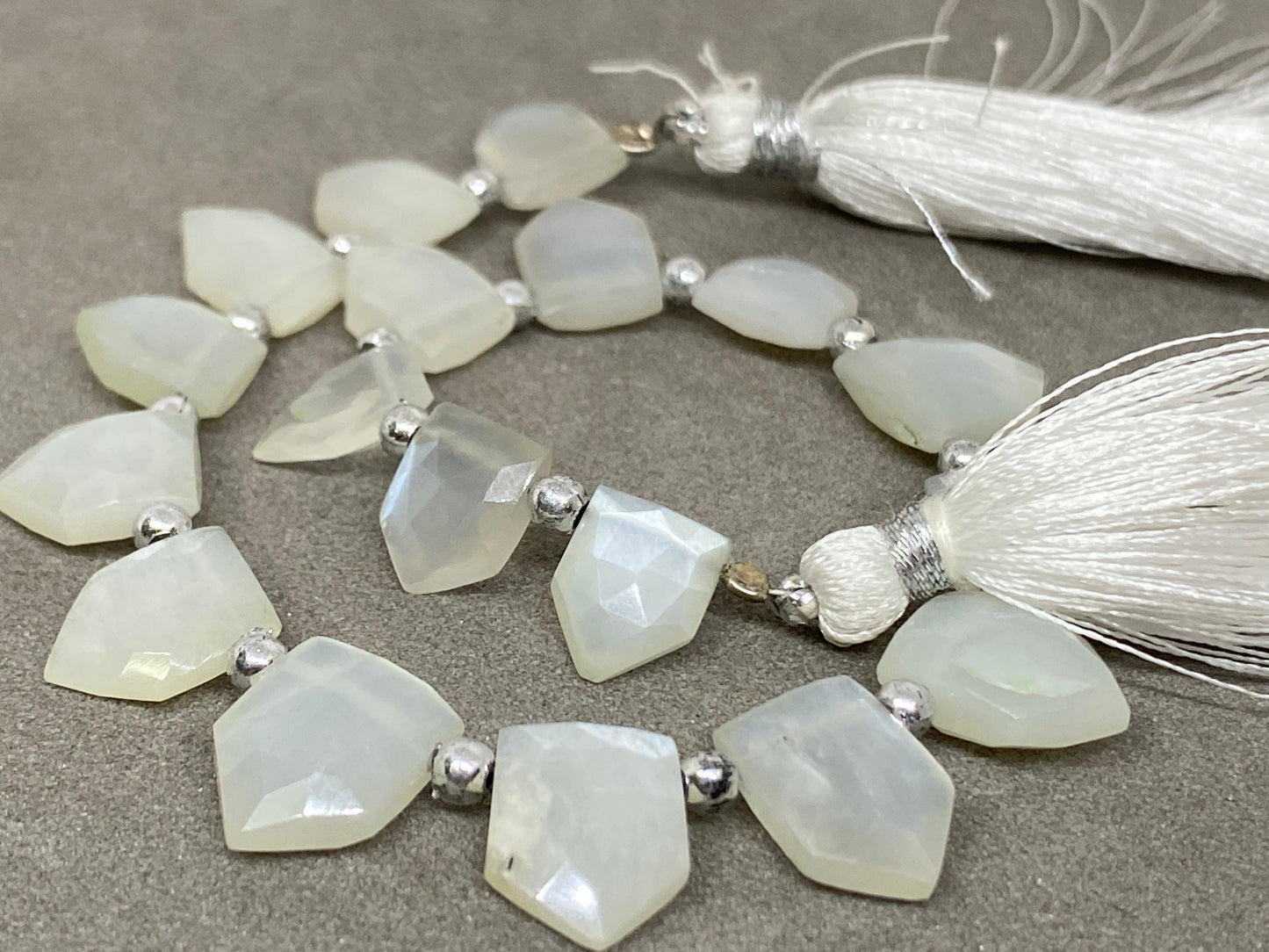 Wow white moonstone faceted pentagon hut briolette 8 inches wt 54 cts  pcs 18 size 9x7mm-12x9mm faceted moonstone hut briolette