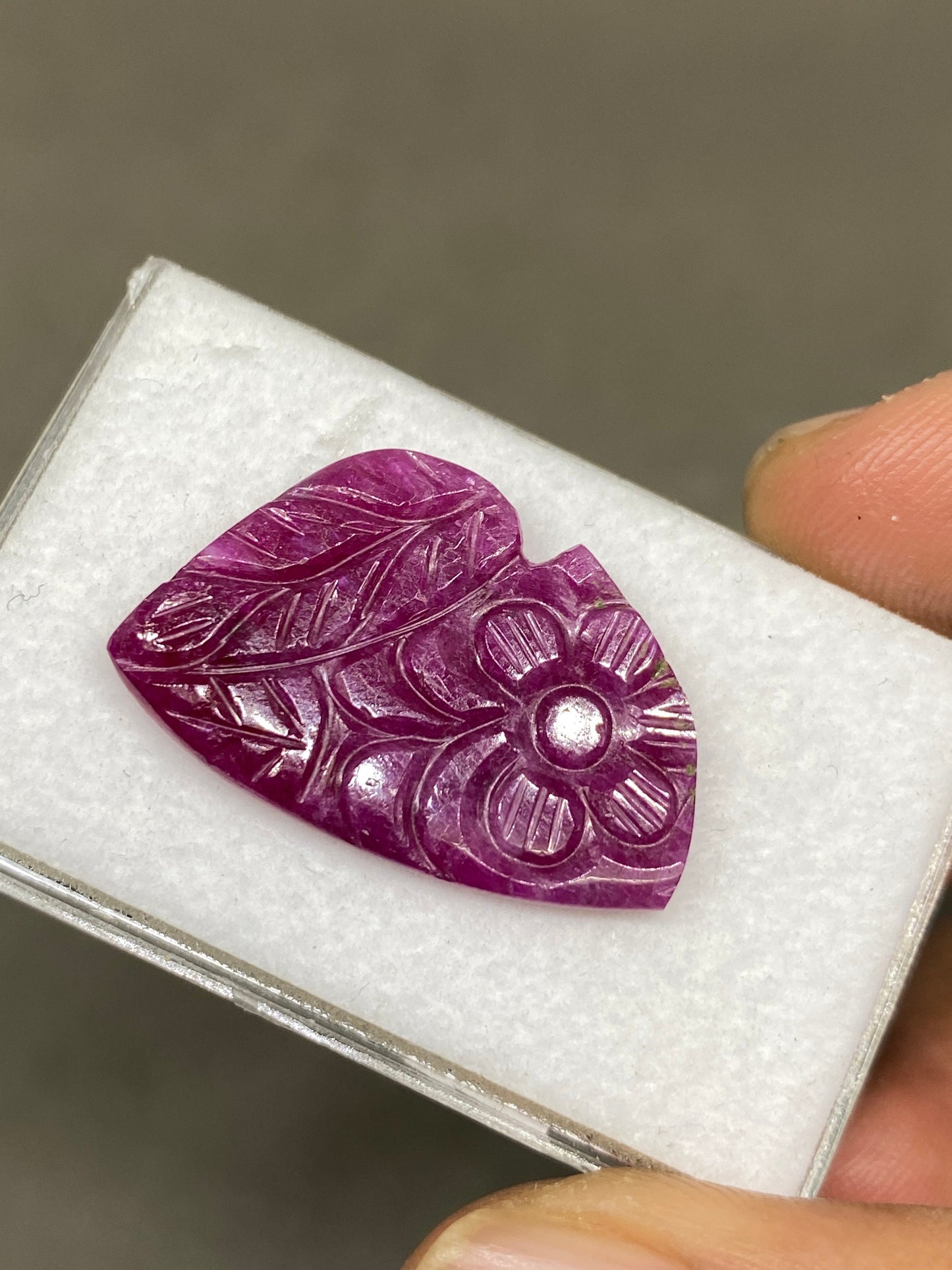 Mesmerising very rare natural ruby handmade flower carving weight 15 carats size 28x18mm ideal for a ring or pendant ruby carving