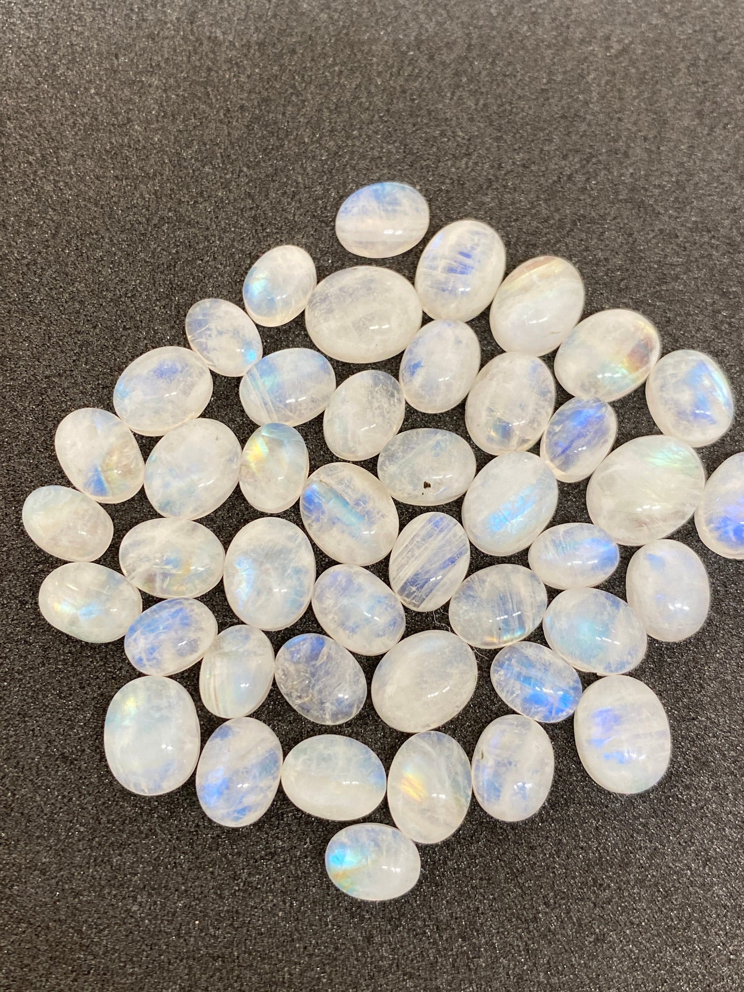 Stunning  fire rainbow moonstone oval cabochons lot size 6-9mm lovely fire rainbow moonstone