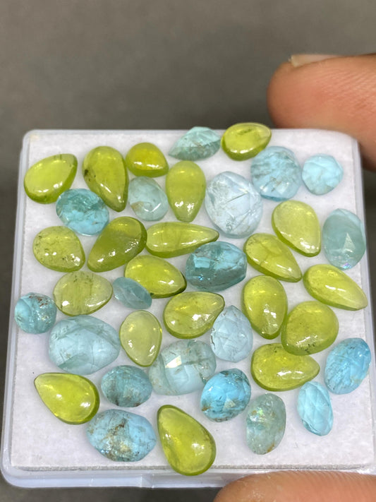 Dazzling rare apatite rosecut  peridot Fine quality cabochons   pcs 39 wt 27.50 carats Size mix 5x3-8x6.8mm gemstone cabochons flat