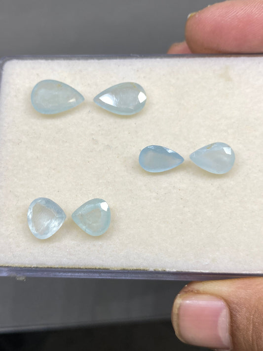 Rare Aquamarine cutstone unmatched pair fine quality pcs 6 wt 12 carats size 9mm-13x9mm eye catching designs fine cutting size wt