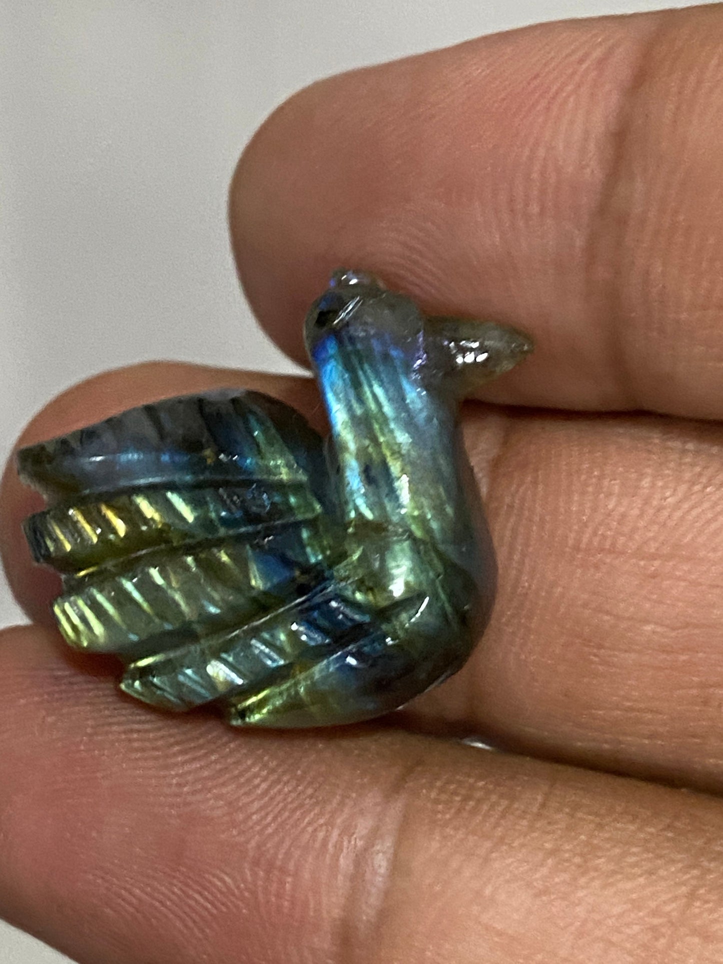 Fascinating blue green Fire duck Labradorite carving labradorite blue green fire duck carving wt 27 cts size 27x21mm gemstone carving