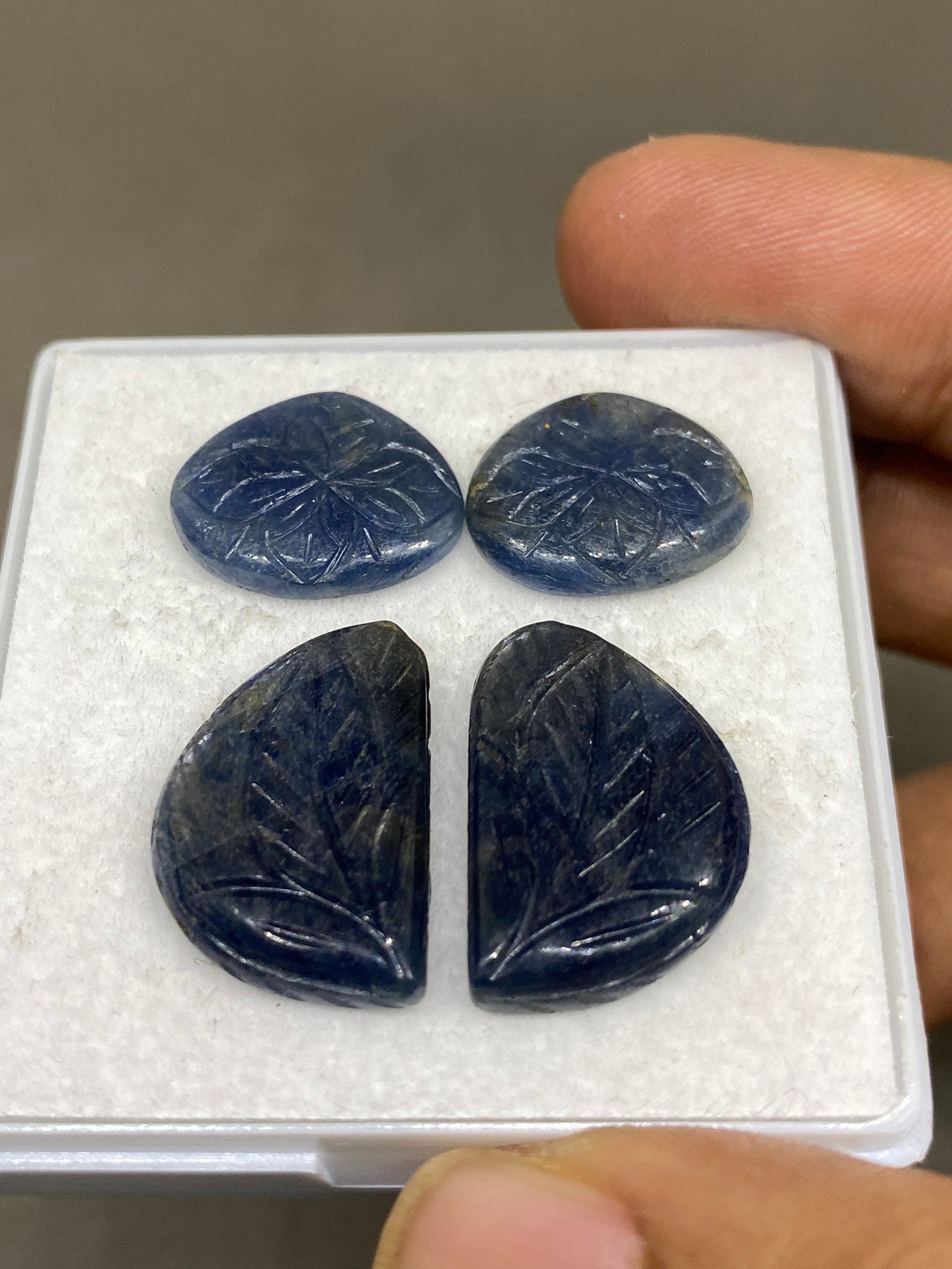 Very rare blue sapphire leaf carving fine quality pcs 4 wt 49 cts size 16x13-21x14mm sapphire carving unheated untreated sapphire earring