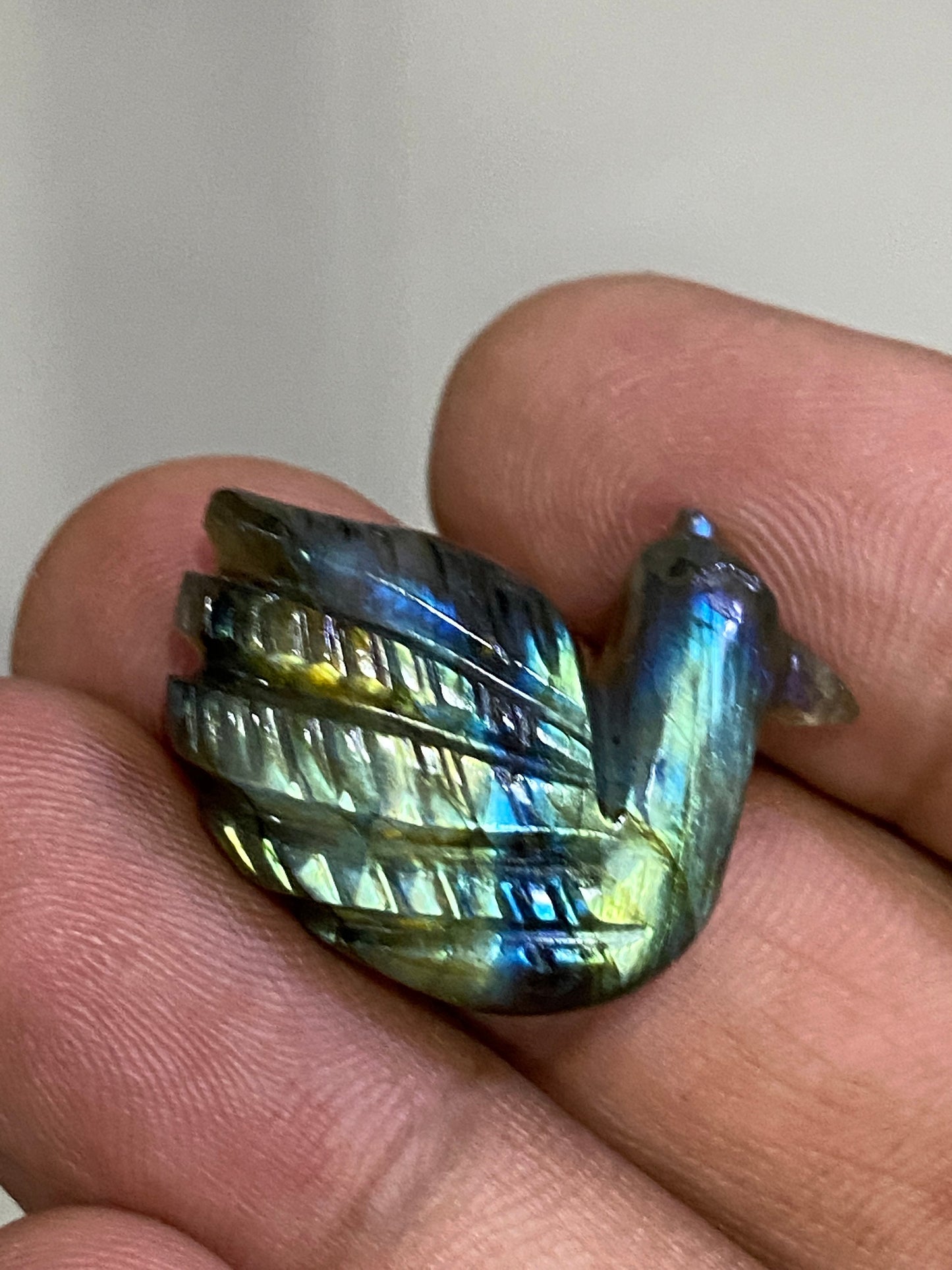 Fascinating blue green Fire duck Labradorite carving labradorite blue green fire duck carving wt 27 cts size 27x21mm gemstone carving