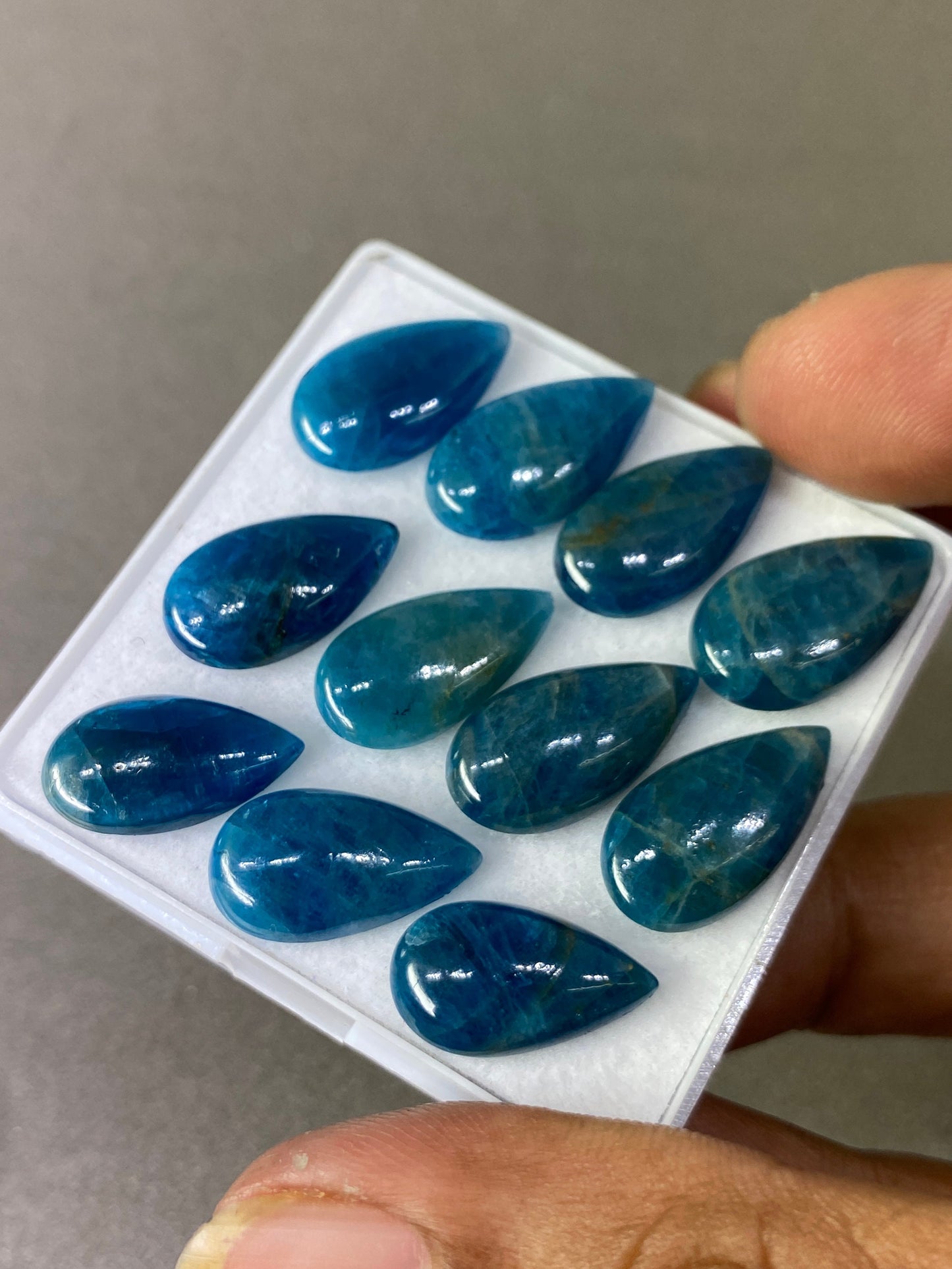 Neon blue apatite flat cabochons pears wholesale lot pcs 11 weight 60 carats size 16x9mm-19x10mm blue apatite cabochons