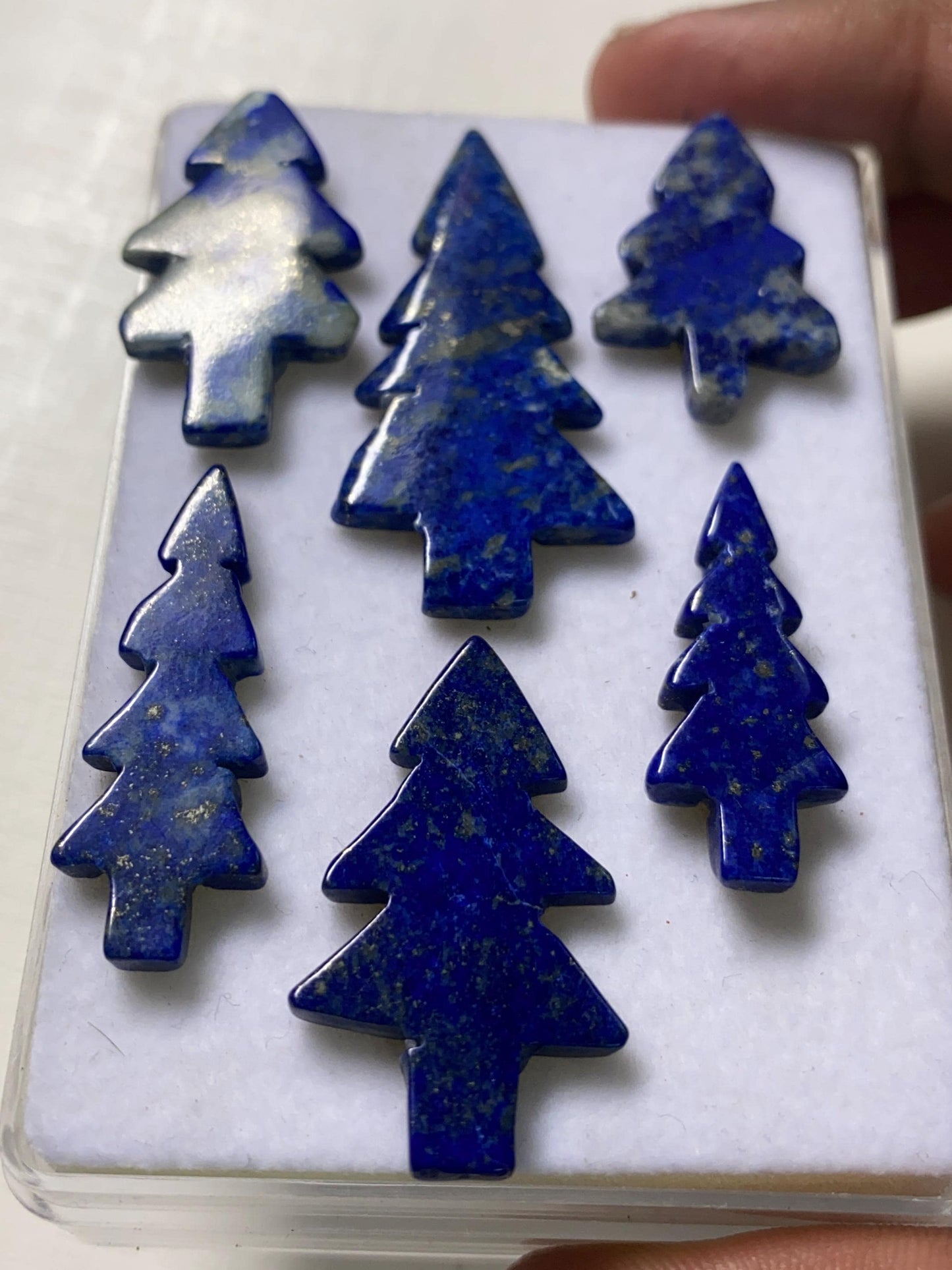 Wow lapis lazuli smooth christmas tree shape carving  pcs 6 wt 77.20 cts size 28x17mm lapis lazuli Christmas tree carving