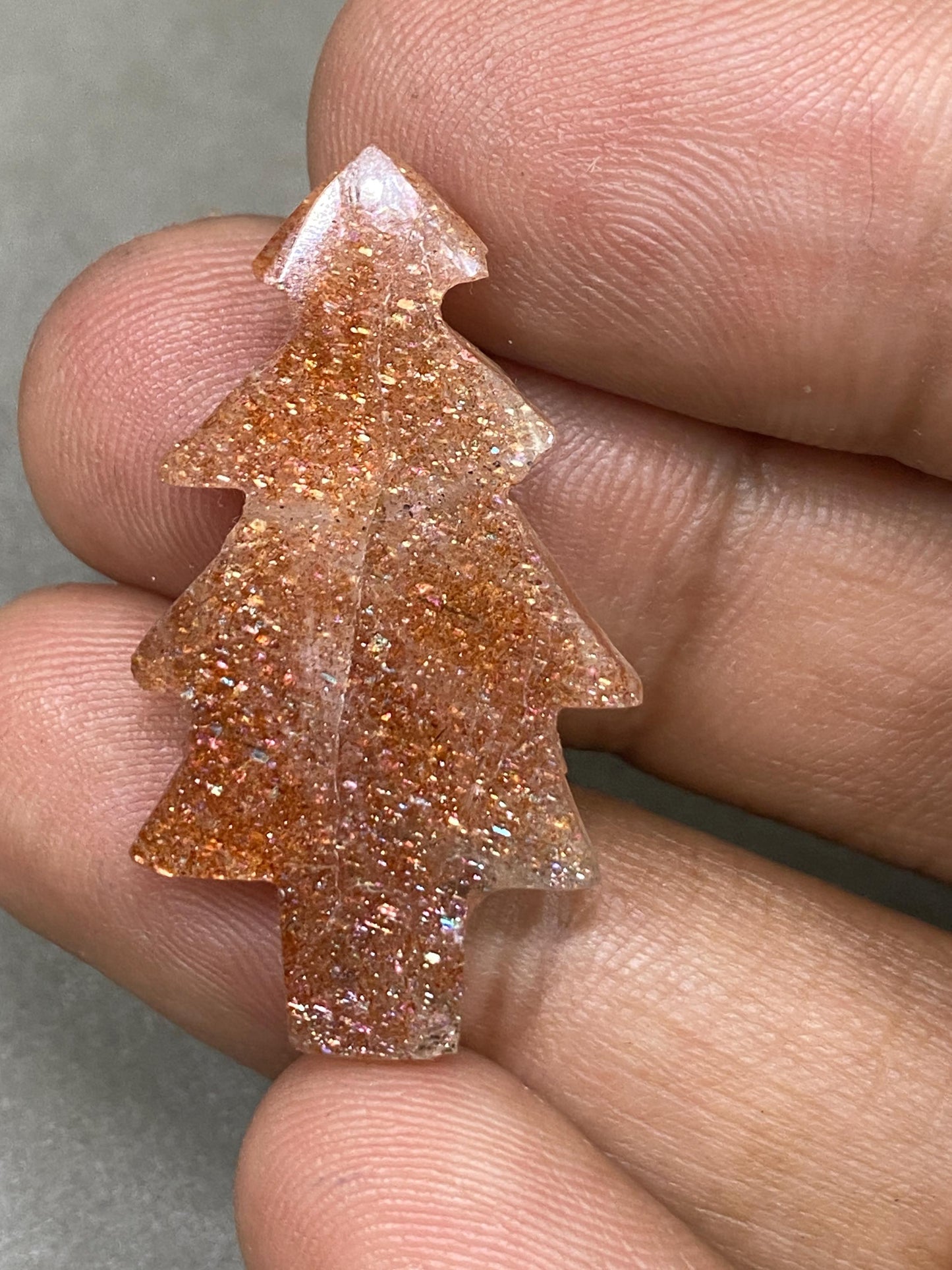 Stunning Confetti Sunstone christmas tree shape carving  pcs 1 wt 19.10 cts size 35x18mm Sunstone Christmas tree carving