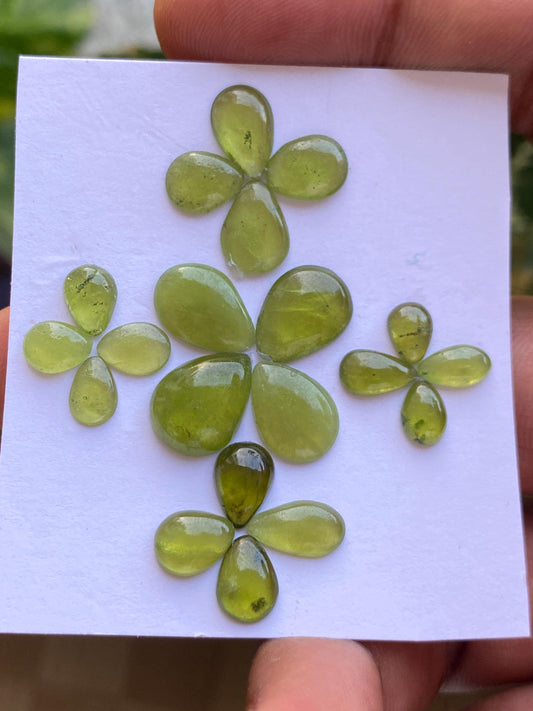 Gorgeous rare fine quality peridot cabochons pear shape wholesale lot weight 27 carats size 6.9x5-13x10mm pieces 20 peridot cabochons