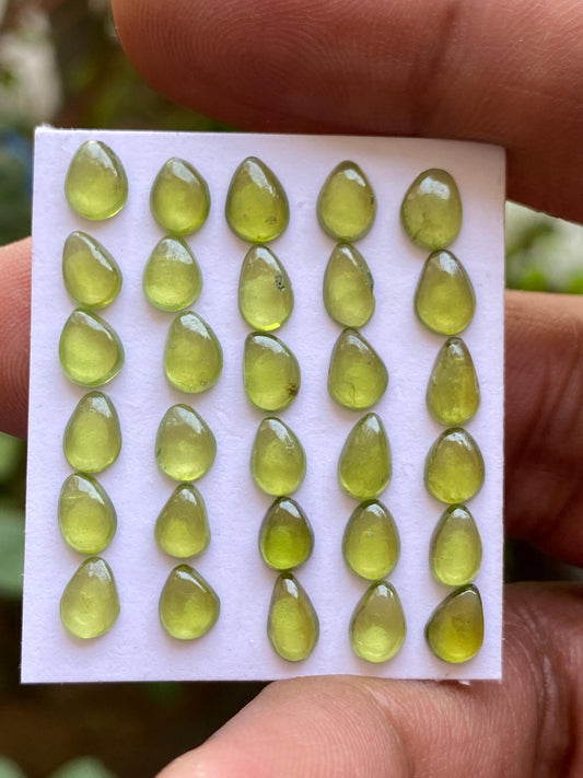 Gorgeous rare fine quality peridot cabochons pear shape wholesale lot weight 13.35 carats size 5.8x4.3mm-6.8x5mm pcs 30 peridot cabochons