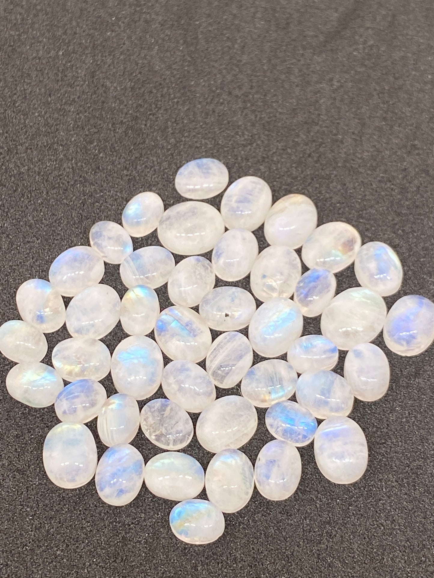 Stunning  fire rainbow moonstone oval cabochons lot size 6-9mm lovely fire rainbow moonstone