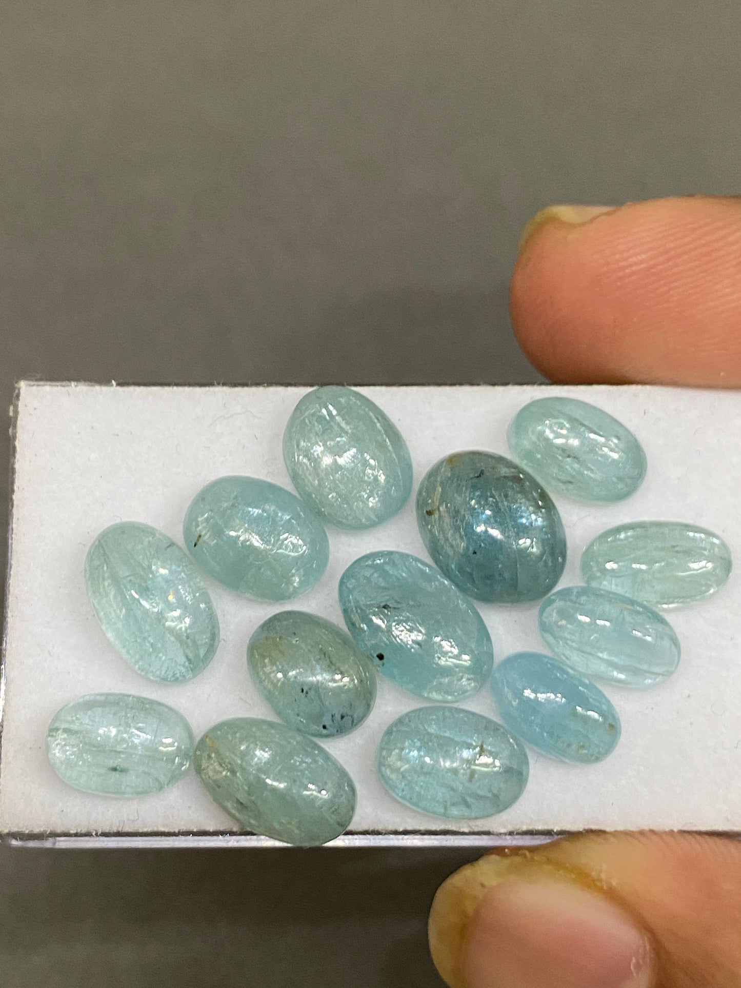 Vivacious rare aqua blue  oval cabochons fine quality wt  34 cts size 9x6mm-11x7mm  pcs 13 aqua kyanite oval smooth cabs