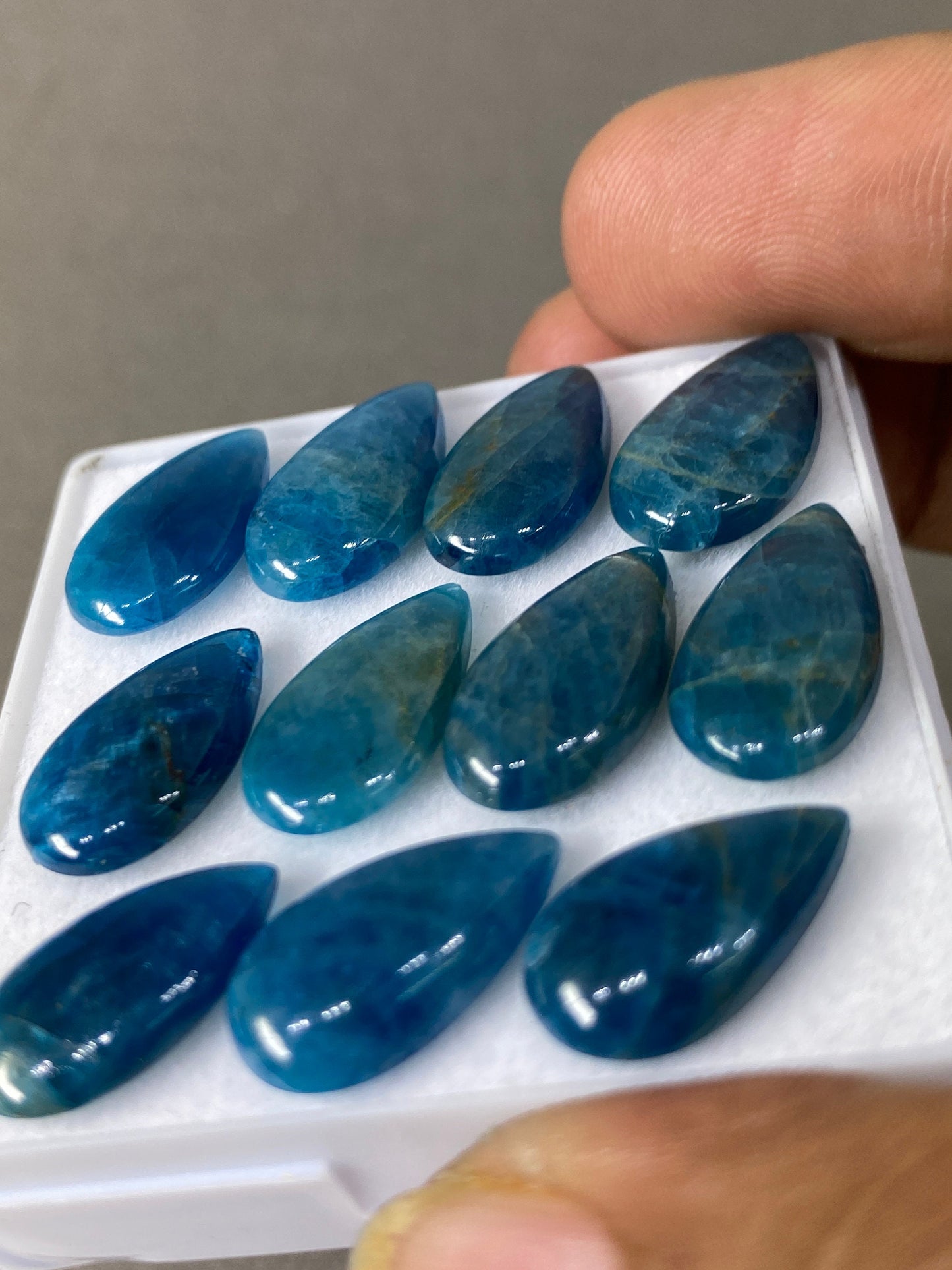 Neon blue apatite flat cabochons pears wholesale lot pcs 11 weight 60 carats size 16x9mm-19x10mm blue apatite cabochons