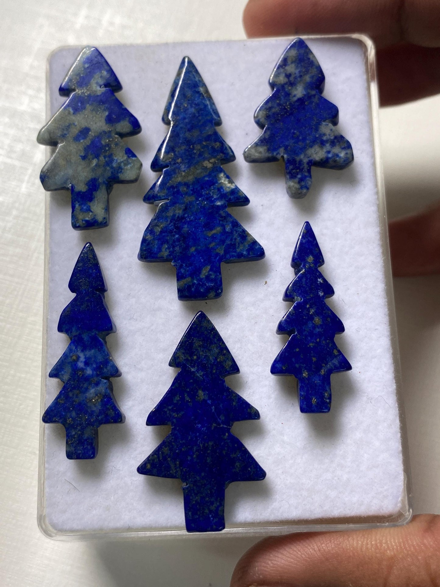 Wow lapis lazuli smooth christmas tree shape carving  pcs 6 wt 77.20 cts size 28x17mm lapis lazuli Christmas tree carving