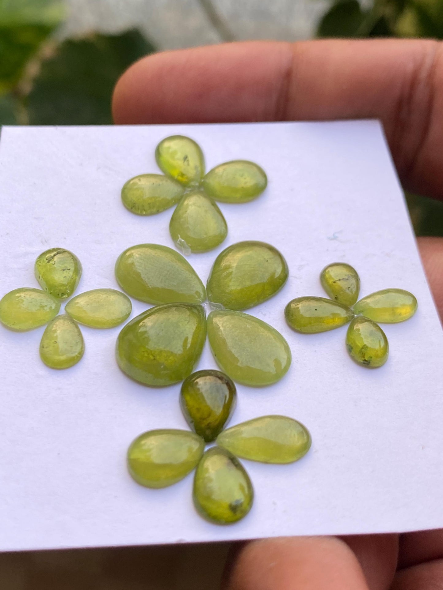 Gorgeous rare fine quality peridot cabochons pear shape wholesale lot weight 27 carats size 6.9x5-13x10mm pieces 20 peridot cabochons