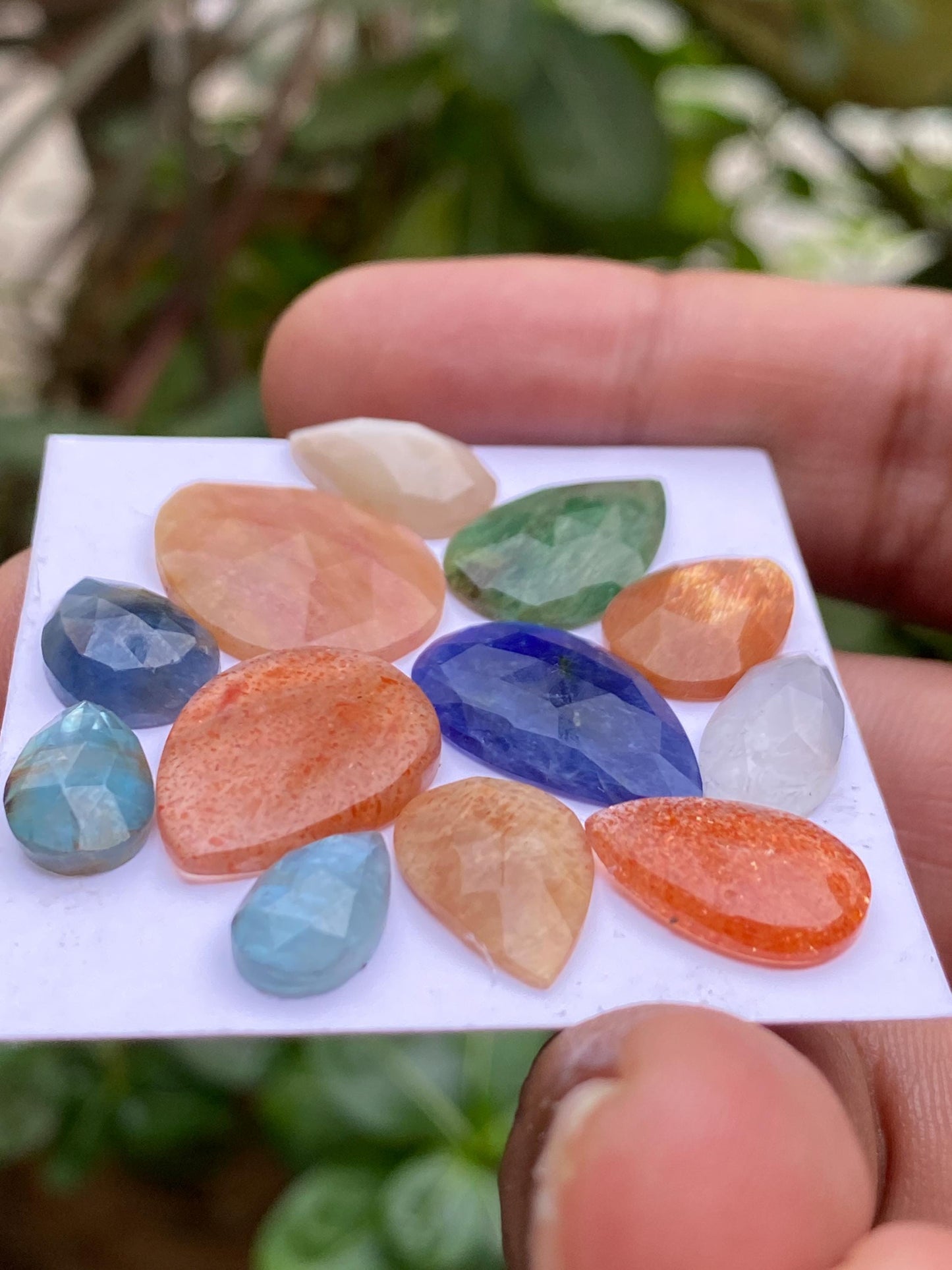 Dazzling multi stones sodalite apatite sunstone sapphire kyanite emerald rosecut pears pcs 12 wt 59.10 carats size 11.8x7mm-22x16mm